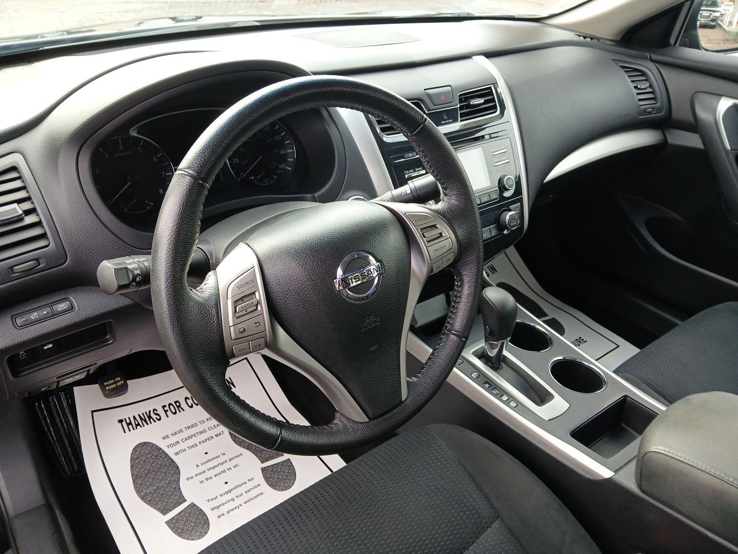 2015 Super Black Nissan Altima 2.5 S (1N4AL3AP8FC) with an 2.5L L4 DOHC 16V engine, Continuously Variable Transmission transmission, located at 880 E. National Road, Vandalia, OH, 45377, (937) 908-9800, 39.891918, -84.183594 - Photo#8