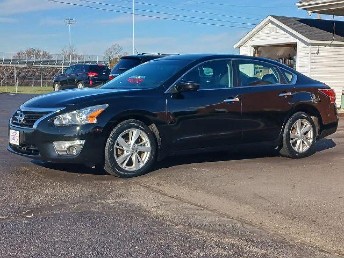 2015 Super Black Nissan Altima 2.5 SV (1N4AL3APXFC) with an 2.5L L4 DOHC 16V engine, Continuously Variable Transmission transmission, located at 401 Woodman Dr, Riverside, OH, 45431, (937) 908-9800, 39.760899, -84.123421 - Photo#2