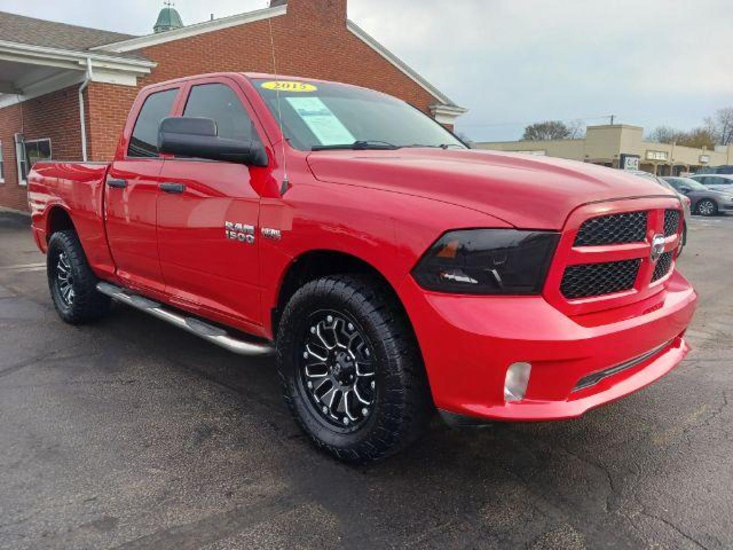 2015 Red RAM 1500 Tradesman Quad Cab 4WD (1C6RR7FT3FS) with an 5.7L V8 OHV 16V engine, 8-Speed Automatic transmission, located at 1184 Kauffman Ave, Fairborn, OH, 45324, (937) 908-9800, 39.807072, -84.030914 - Photo#0