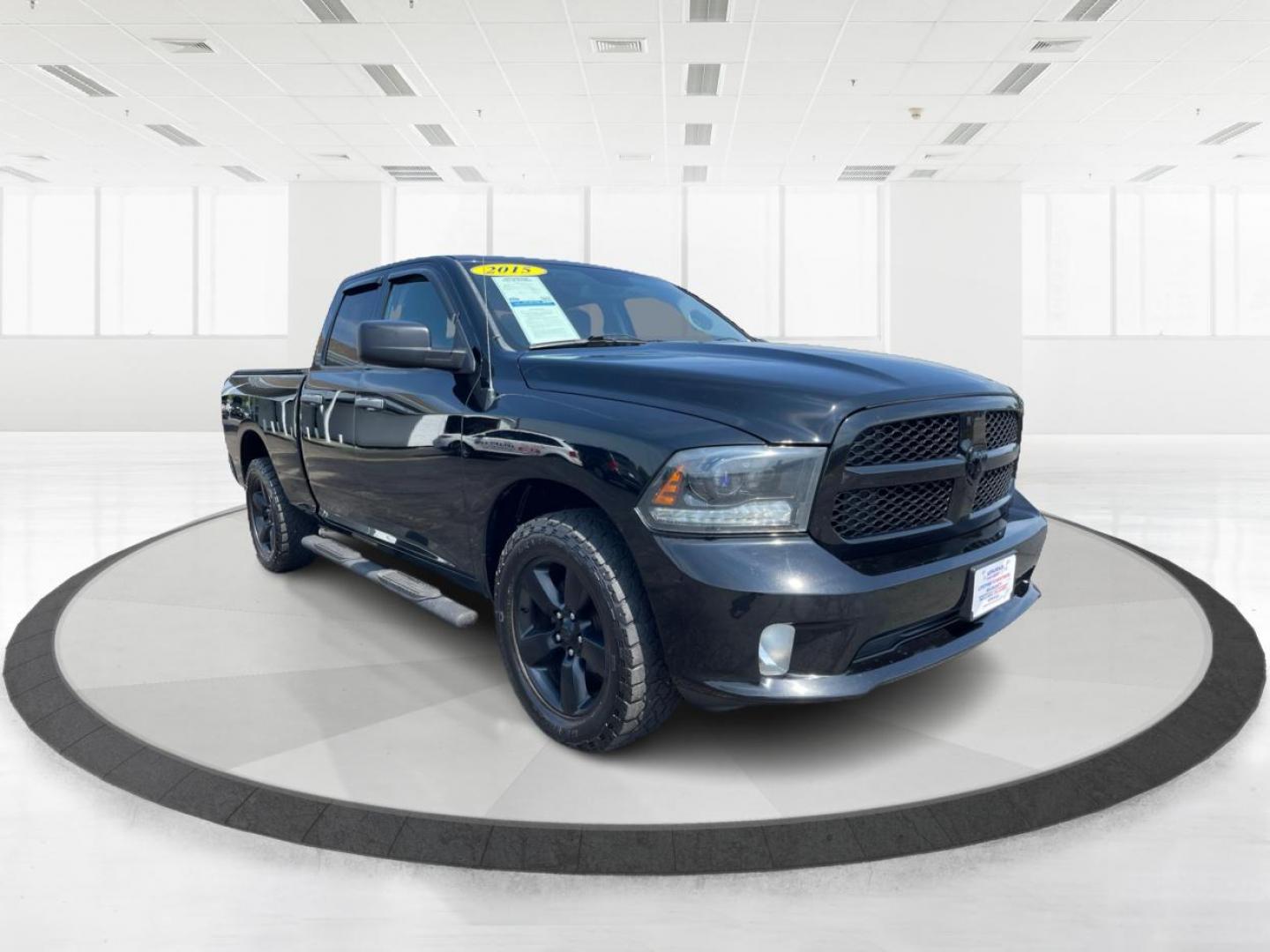 2015 Black RAM 1500 Tradesman Quad Cab 4WD (1C6RR7FTXFS) with an 5.7L V8 OHV 16V engine, 6-Speed Automatic transmission, located at 1184 Kauffman Ave, Fairborn, OH, 45324, (937) 908-9800, 39.807072, -84.030914 - Photo#0