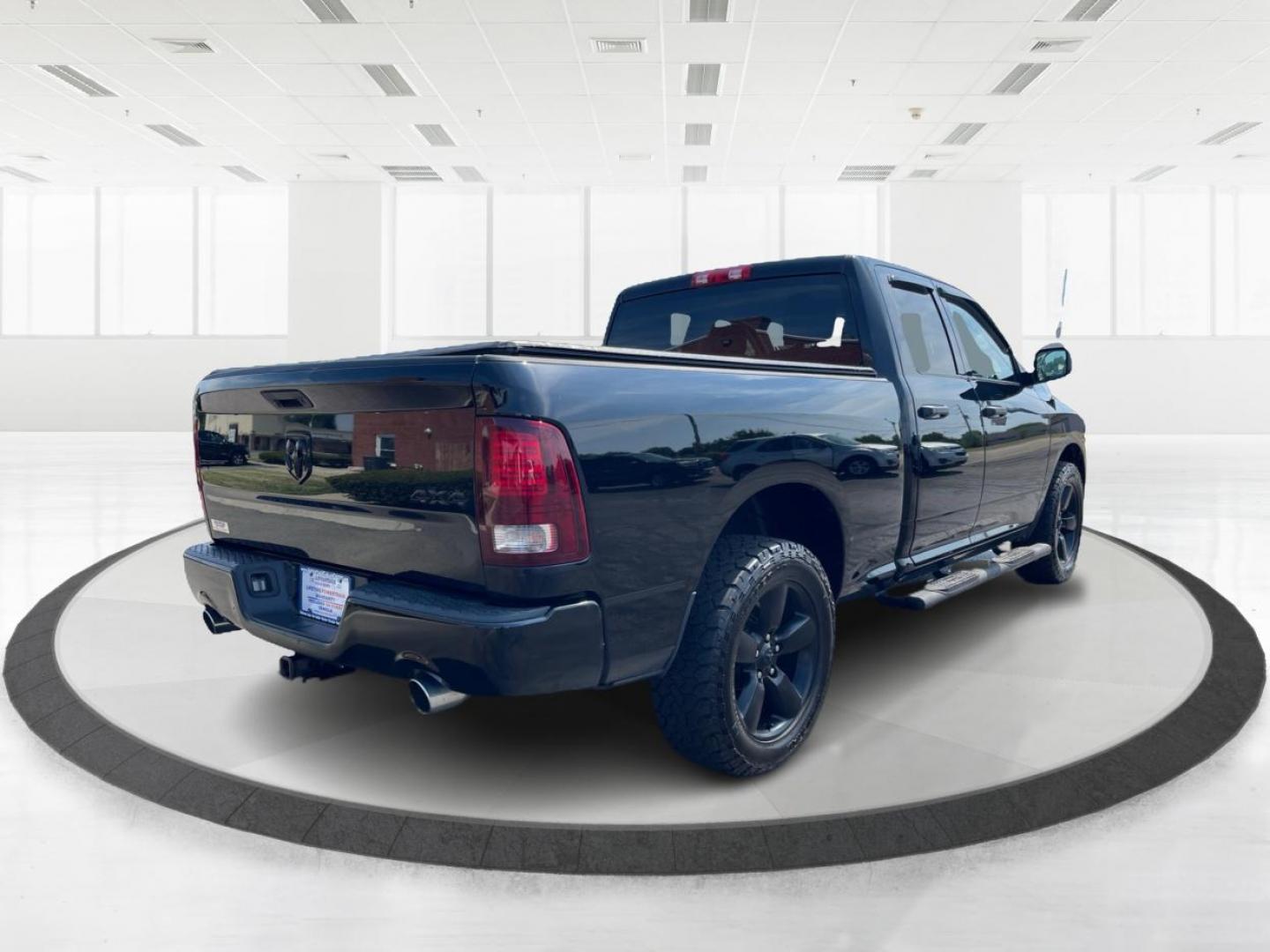 2015 Black RAM 1500 Tradesman Quad Cab 4WD (1C6RR7FTXFS) with an 5.7L V8 OHV 16V engine, 6-Speed Automatic transmission, located at 1184 Kauffman Ave, Fairborn, OH, 45324, (937) 908-9800, 39.807072, -84.030914 - Photo#2