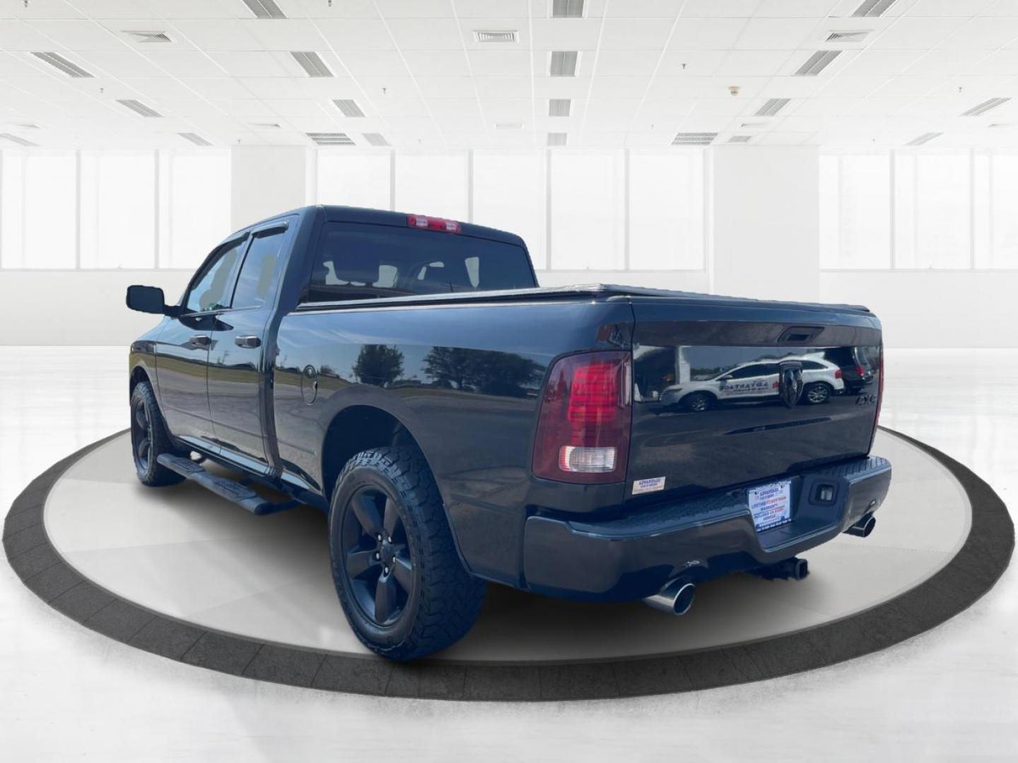 2015 Black RAM 1500 Tradesman Quad Cab 4WD (1C6RR7FTXFS) with an 5.7L V8 OHV 16V engine, 6-Speed Automatic transmission, located at 1184 Kauffman Ave, Fairborn, OH, 45324, (937) 908-9800, 39.807072, -84.030914 - Photo#4