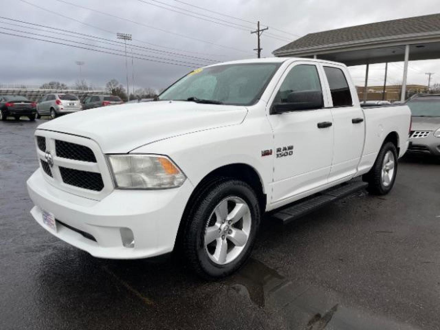 2015 White RAM 1500 Tradesman Quad Cab 4WD (1C6RR7FTXFS) with an 5.7L V8 OHV 16V engine, 8-Speed Automatic transmission, located at 1184 Kauffman Ave, Fairborn, OH, 45324, (937) 908-9800, 39.807072, -84.030914 - Photo#1