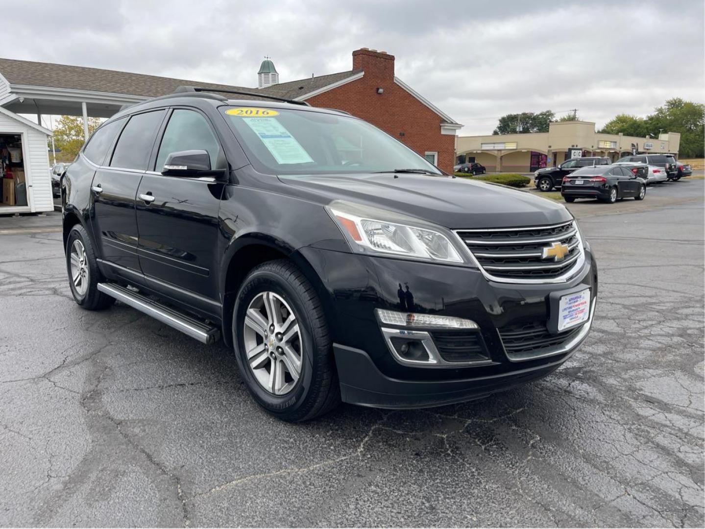 2016 Black Chevrolet Traverse 2LT AWD (1GNKVHKD8GJ) with an 3.6L V6 DOHC 24V engine, 6-Speed Automatic transmission, located at 1099 N County Rd 25A , Troy, OH, 45373, (937) 908-9800, 40.057079, -84.212883 - Photo#0