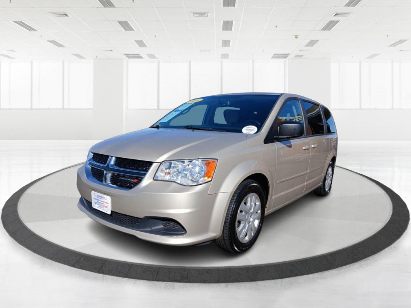 2016 Cashmere/Sandstone Pearl Coat Dodge Grand Caravan SE (2C4RDGBG4GR) with an 3.6L V6 DOHC 24V engine, 6A transmission, located at 1184 Kauffman Ave, Fairborn, OH, 45324, (937) 908-9800, 39.807072, -84.030914 - Photo#7