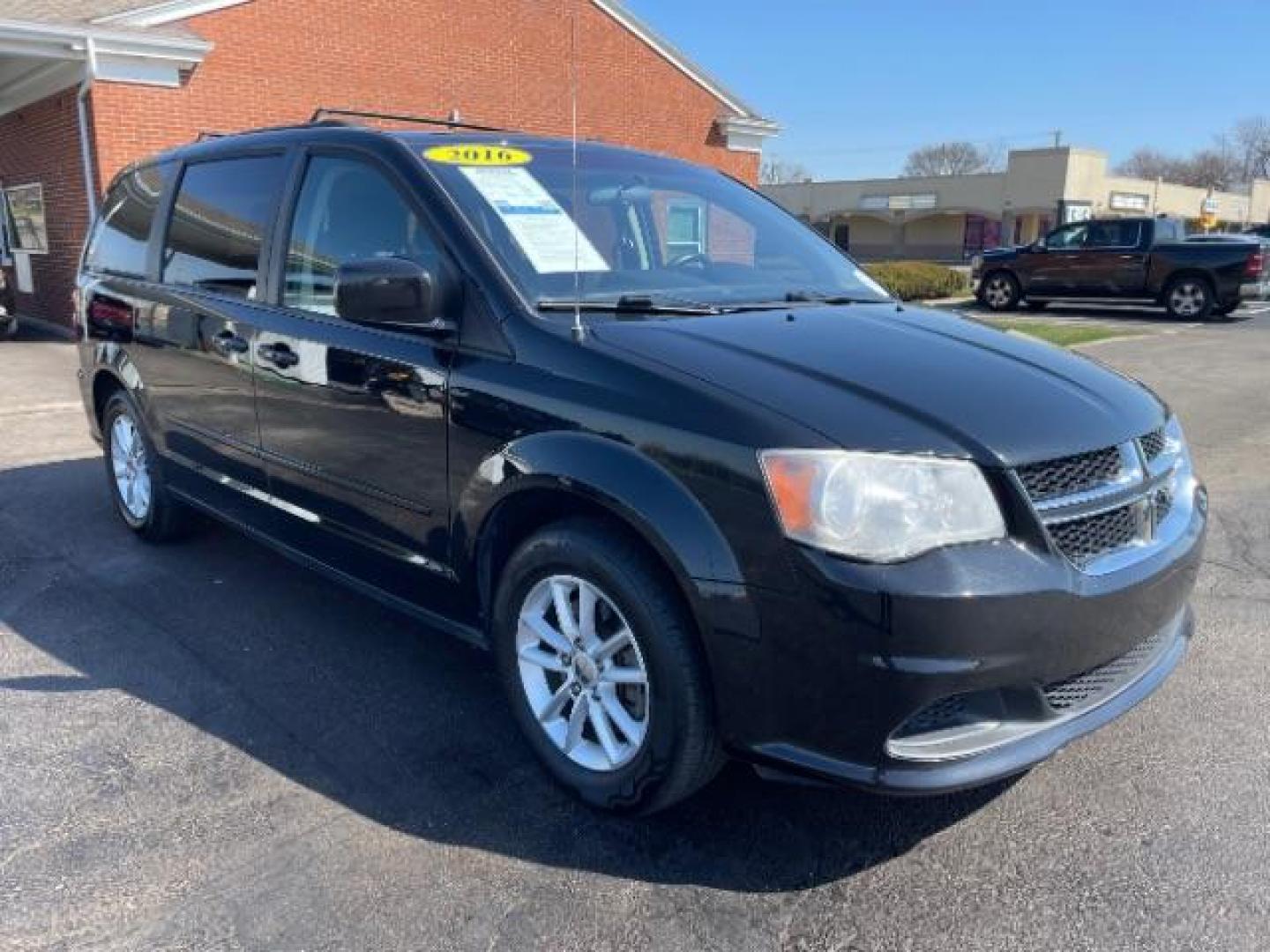 2016 Brilliant Black Crystal Pearl Coat Dodge Grand Caravan SXT (2C4RDGCG1GR) with an 3.6L V6 DOHC 24V engine, 6-Speed Automatic transmission, located at 401 Woodman Dr, Riverside, OH, 45431, (937) 908-9800, 39.760899, -84.123421 - Photo#0