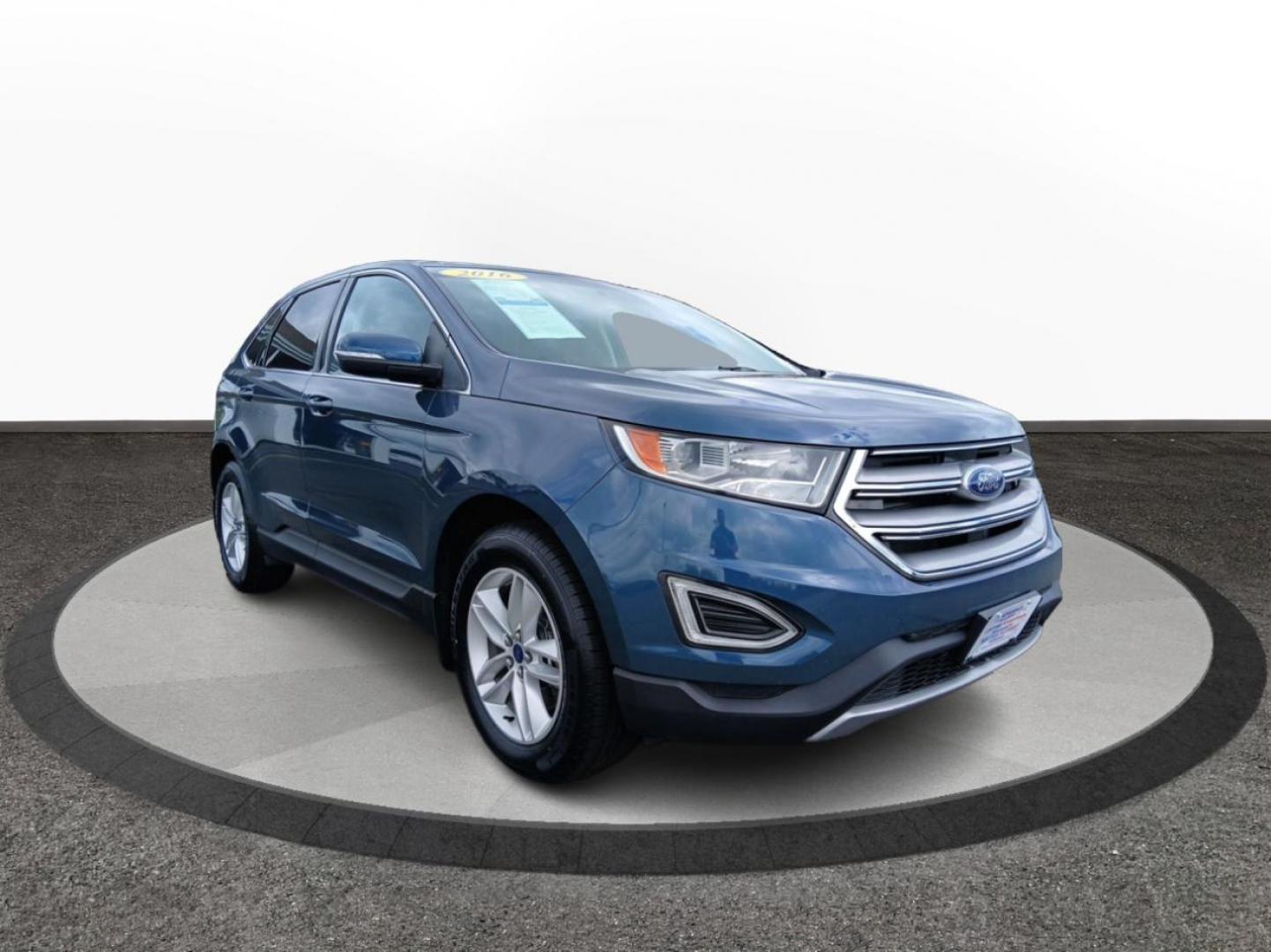 2016 Kona Blue Metallic Ford Edge SEL AWD (2FMPK4J83GB) with an 3.5L V6 DOHC 24V engine, 6A transmission, located at 1184 Kauffman Ave, Fairborn, OH, 45324, (937) 908-9800, 39.807072, -84.030914 - Photo#0