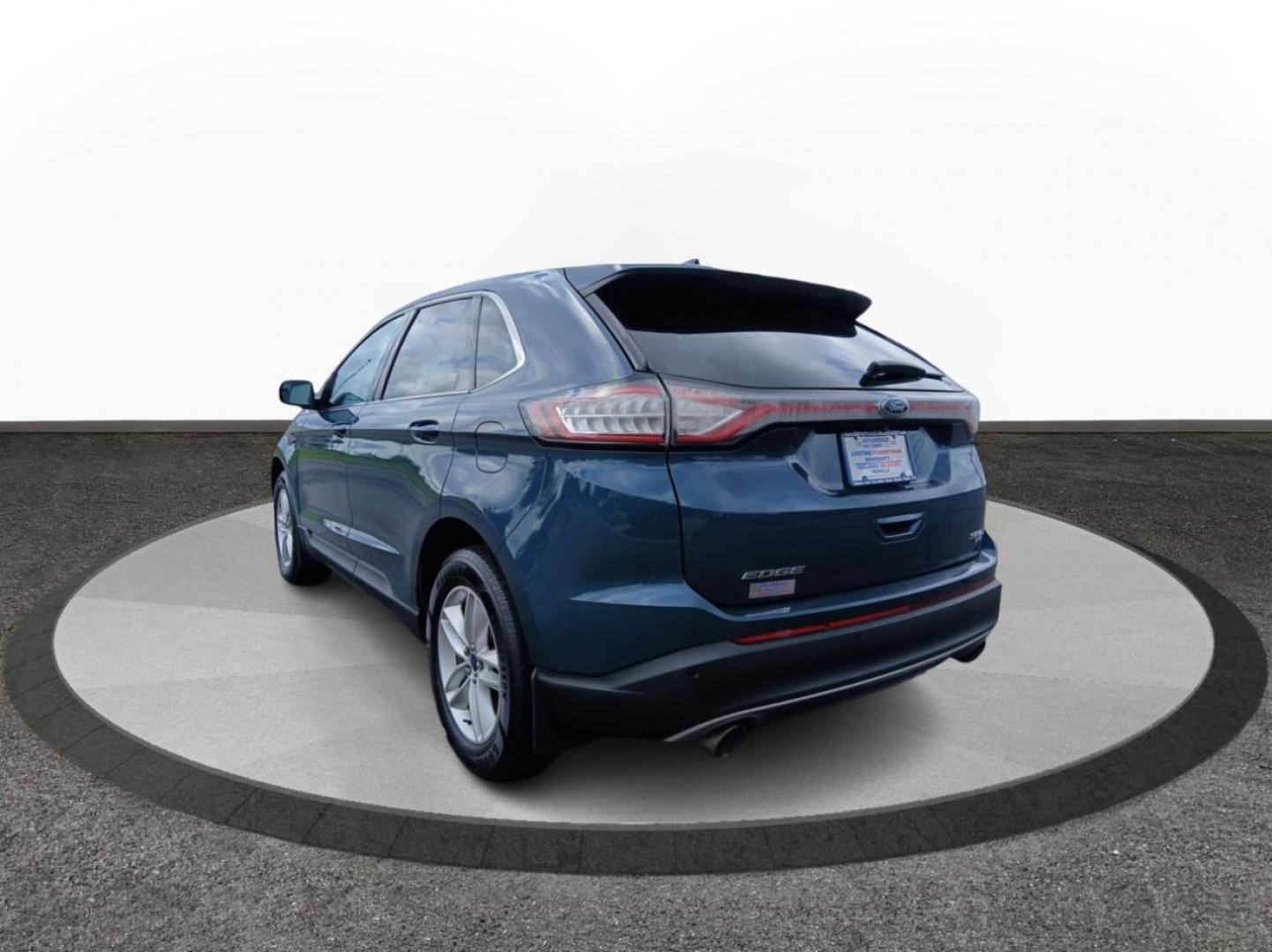 2016 Kona Blue Metallic Ford Edge SEL AWD (2FMPK4J83GB) with an 3.5L V6 DOHC 24V engine, 6A transmission, located at 1184 Kauffman Ave, Fairborn, OH, 45324, (937) 908-9800, 39.807072, -84.030914 - Photo#4