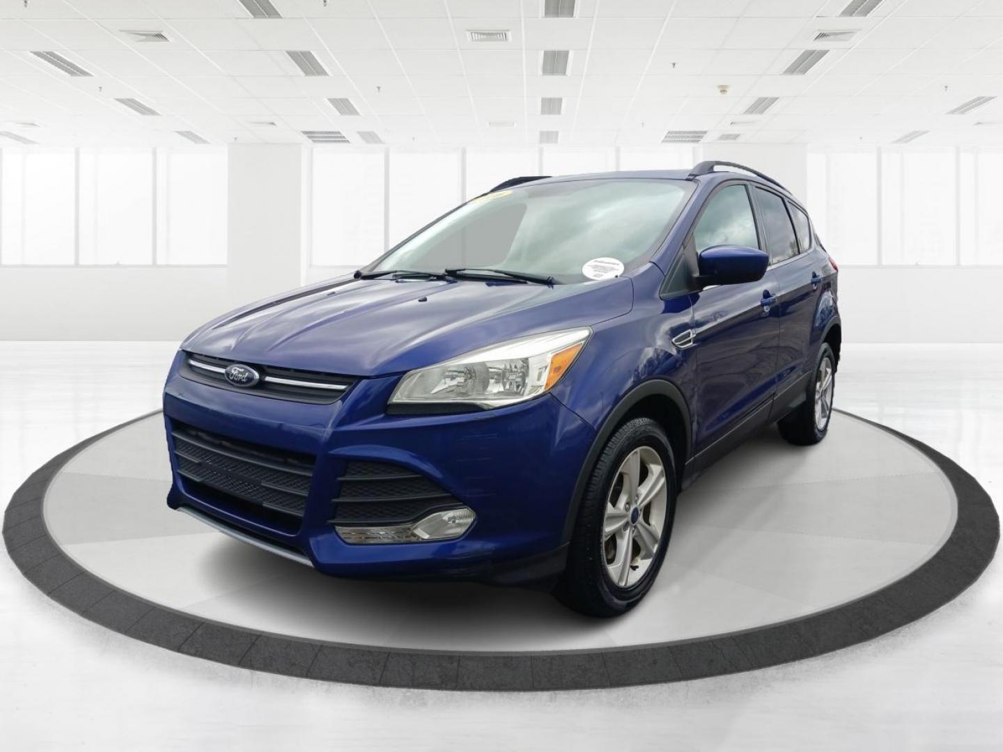 2016 Deep Impact Blue Metallic Ford Escape SE 4WD (1FMCU9G9XGU) with an 2.0L L4 DOHC 16V engine, 6-Speed Automatic transmission, located at 4508 South Dixie Dr, Moraine, OH, 45439, (937) 908-9800, 39.689976, -84.218452 - Photo#7