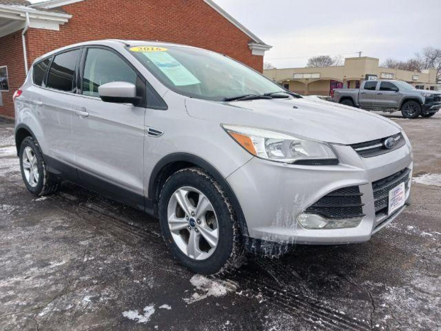 2016 Ingot Silver Metallic Ford Escape SE 4WD (1FMCU9G96GU) with an 2.0L L4 DOHC 16V engine, 6-Speed Automatic transmission, located at 880 E. National Road, Vandalia, OH, 45377, (937) 908-9800, 39.891918, -84.183594 - Photo#0