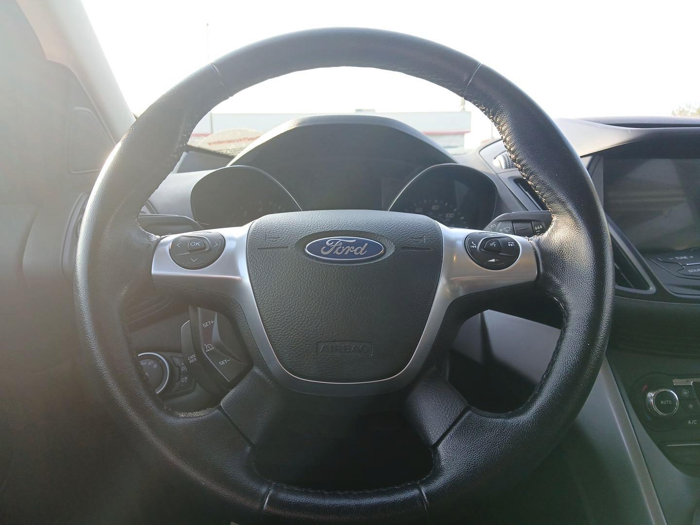 2016 Sunset Metallic Ford Escape SE 4WD (1FMCU9G95GU) with an 2.0L L4 DOHC 16V engine, 6-Speed Automatic transmission, located at 4508 South Dixie Dr, Moraine, OH, 45439, (937) 908-9800, 39.689976, -84.218452 - Photo#14