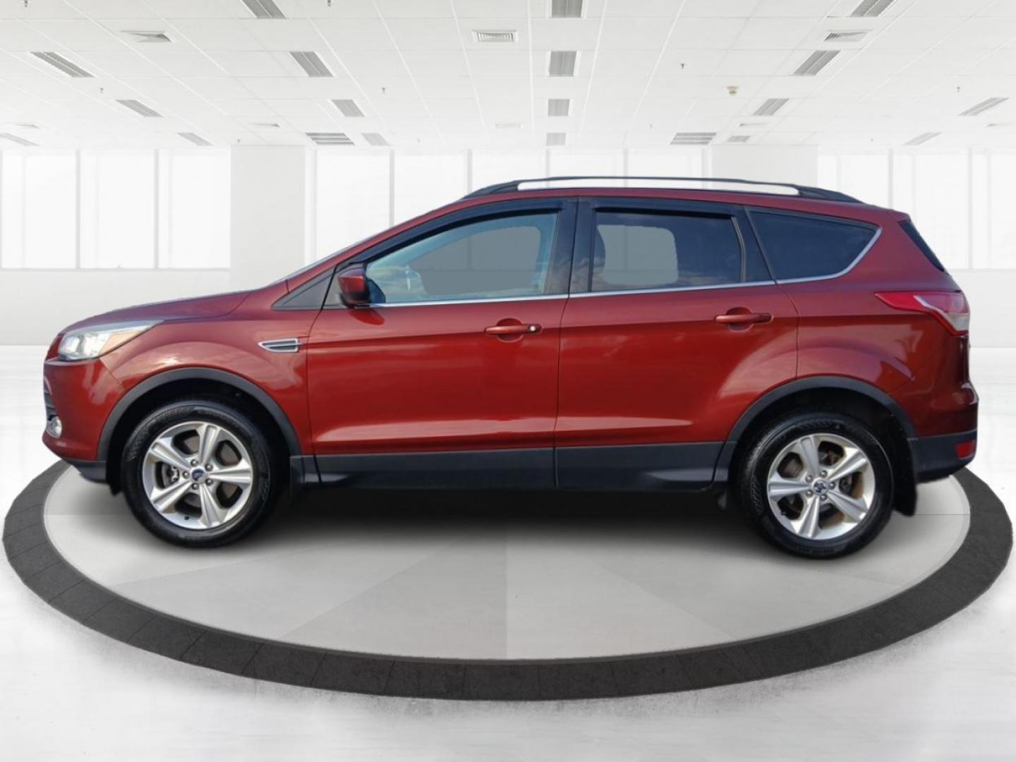 2016 Sunset Metallic Ford Escape SE 4WD (1FMCU9G95GU) with an 2.0L L4 DOHC 16V engine, 6-Speed Automatic transmission, located at 4508 South Dixie Dr, Moraine, OH, 45439, (937) 908-9800, 39.689976, -84.218452 - Photo#3