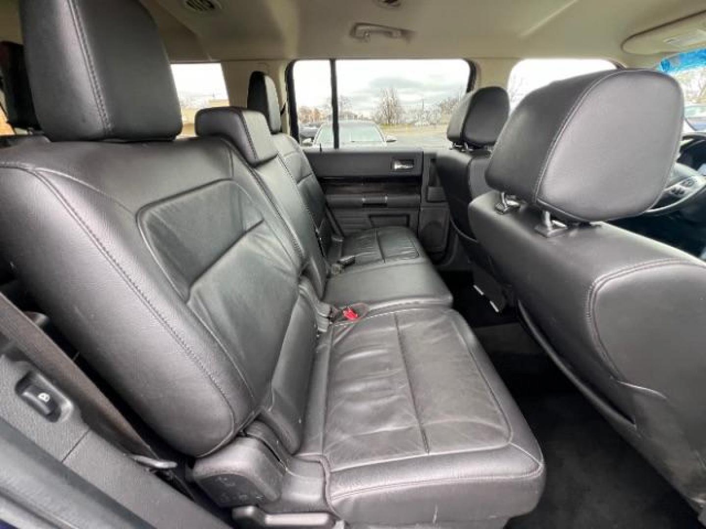 2016 Kona Blue Metallic Ford Flex SEL AWD (2FMHK6C86GB) with an 3.5L V6 DOHC 24V engine, 6-Speed Automatic Overdrive transmission, located at 1184 Kauffman Ave, Fairborn, OH, 45324, (937) 908-9800, 39.807072, -84.030914 - Photo#9