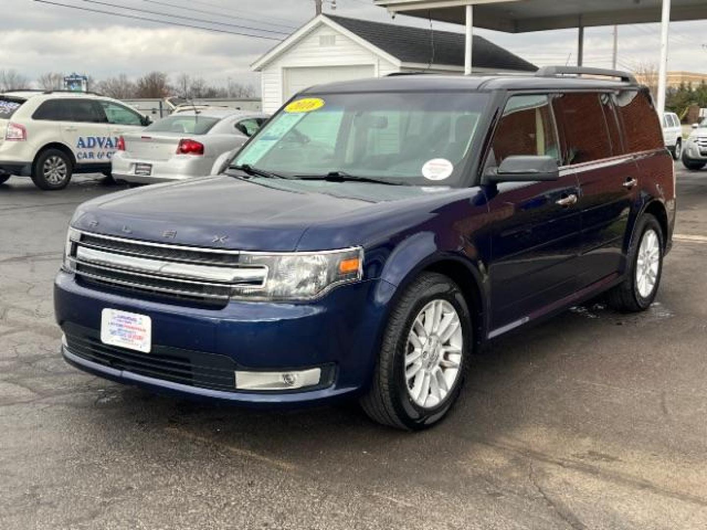 2016 Kona Blue Metallic Ford Flex SEL AWD (2FMHK6C86GB) with an 3.5L V6 DOHC 24V engine, 6-Speed Automatic Overdrive transmission, located at 1184 Kauffman Ave, Fairborn, OH, 45324, (937) 908-9800, 39.807072, -84.030914 - Photo#2