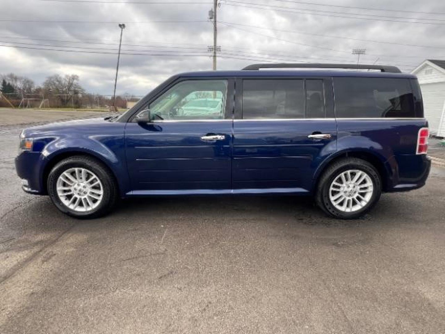 2016 Kona Blue Metallic Ford Flex SEL AWD (2FMHK6C86GB) with an 3.5L V6 DOHC 24V engine, 6-Speed Automatic Overdrive transmission, located at 1184 Kauffman Ave, Fairborn, OH, 45324, (937) 908-9800, 39.807072, -84.030914 - Photo#3