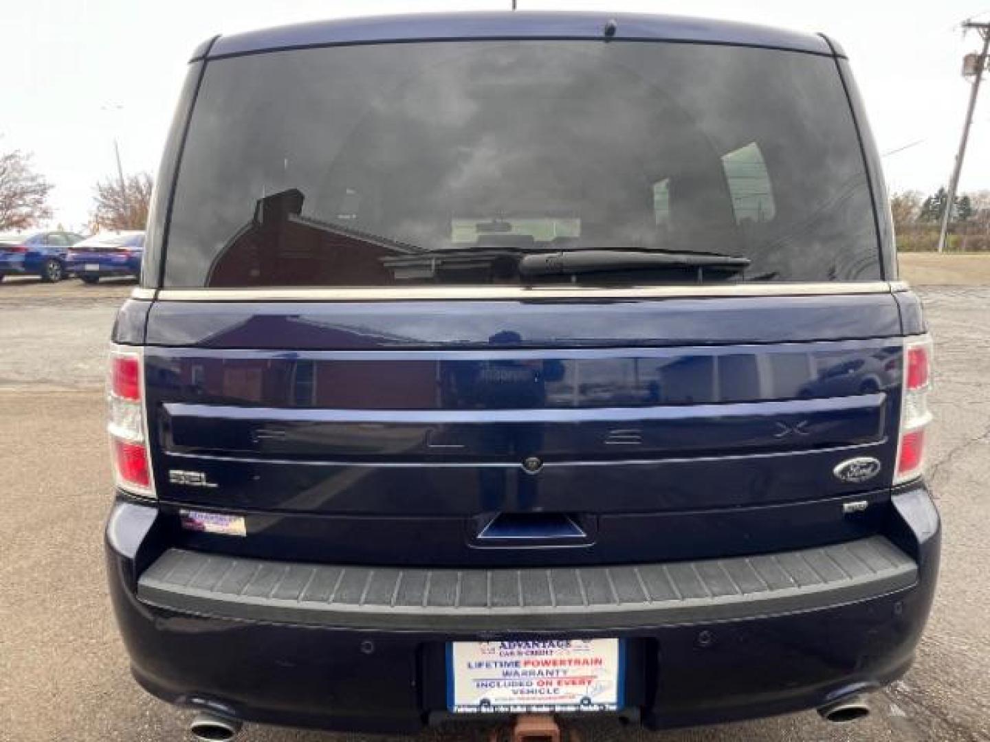 2016 Kona Blue Metallic Ford Flex SEL AWD (2FMHK6C86GB) with an 3.5L V6 DOHC 24V engine, 6-Speed Automatic Overdrive transmission, located at 1184 Kauffman Ave, Fairborn, OH, 45324, (937) 908-9800, 39.807072, -84.030914 - Photo#4