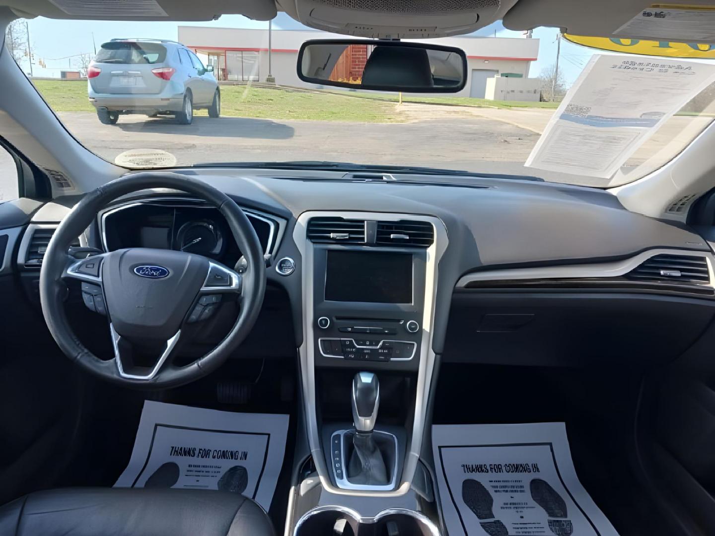 2016 Shadow Black Ford Fusion (3FA6P0T99GR) with an 2.0L L4 DOHC 16V engine, 6-Speed Automatic transmission, located at 1099 N County Rd 25A , Troy, OH, 45373, (937) 908-9800, 40.057079, -84.212883 - Photo#6