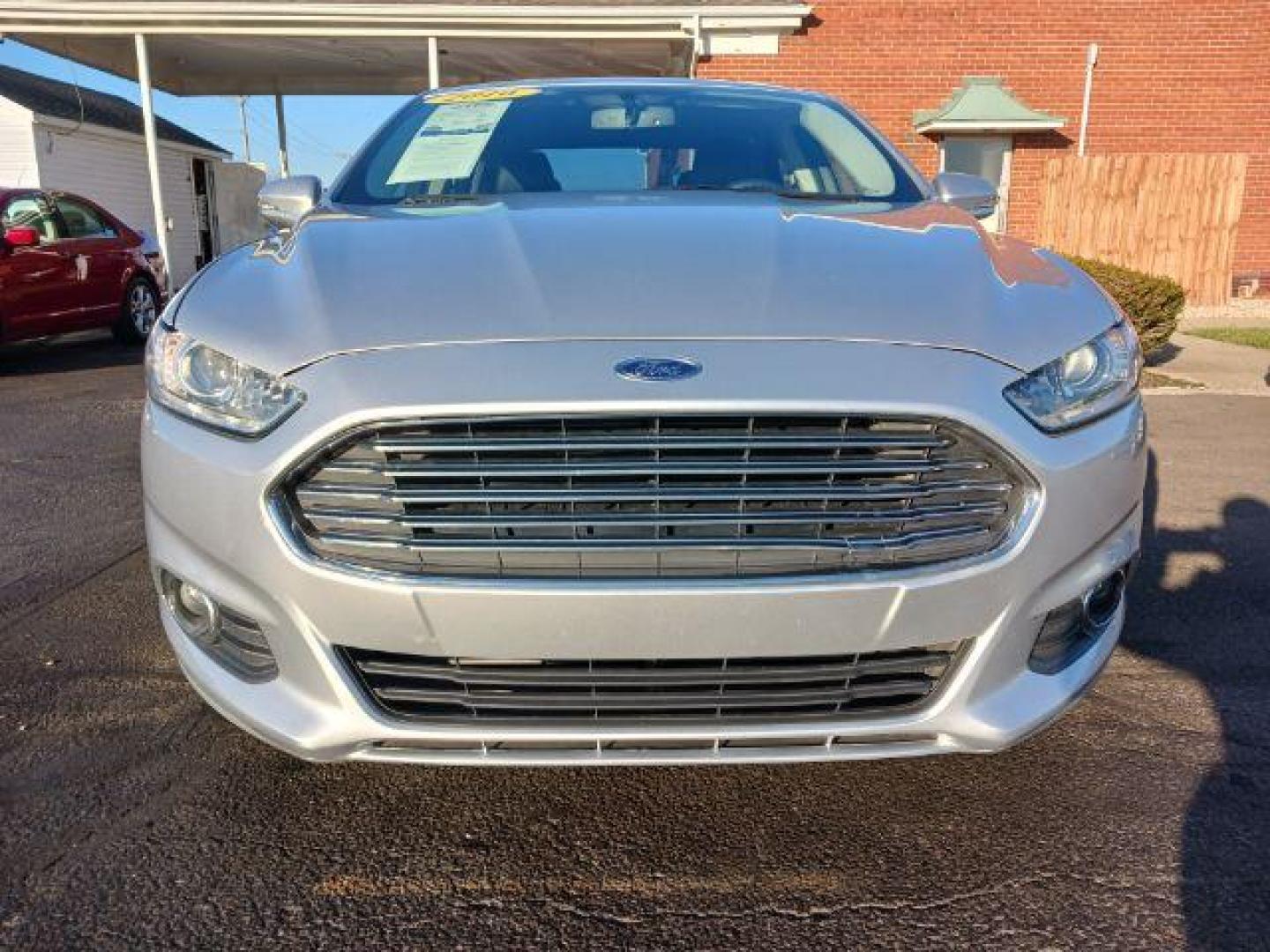 2016 Ingot Silver Metallic Ford Fusion SE (3FA6P0H99GR) with an 2.0L L4 DOHC 16V engine, 6-Speed Automatic transmission, located at 1230 East Main St, Xenia, OH, 45385, (937) 908-9800, 39.688026, -83.910172 - Photo#1