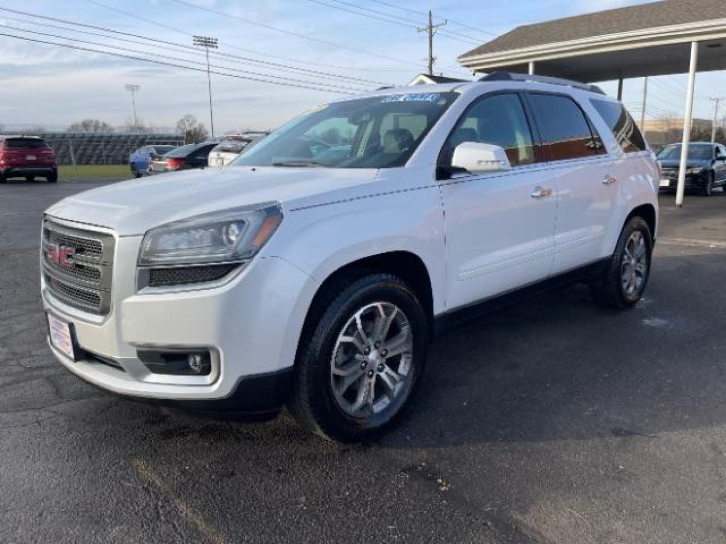 2016 Summit White GMC Acadia SLT-1 FWD (1GKKRRKD7GJ) with an 3.6L V6 DOHC 24V engine, 6-Speed Automatic transmission, located at 1230 East Main St, Xenia, OH, 45385, (937) 908-9800, 39.688026, -83.910172 - Photo#1