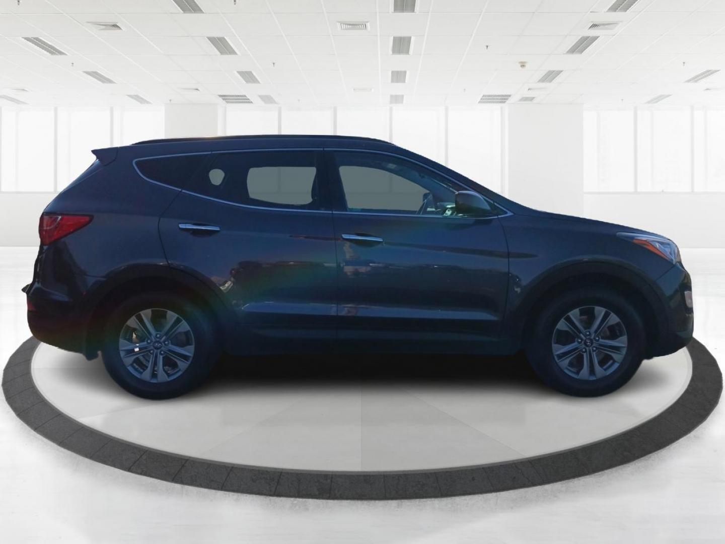 2016 Marlin Blue Hyundai Santa Fe Sport 2.4 AWD (5XYZUDLB5GG) with an 2.4L L4 DOHC 16V engine, 6-Speed Automatic transmission, located at 1184 Kauffman Ave, Fairborn, OH, 45324, (937) 908-9800, 39.807072, -84.030914 - Photo#1