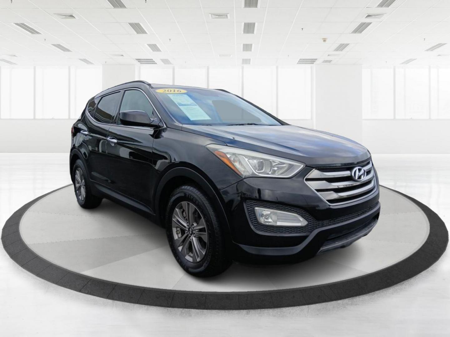 2016 Twilight Black Hyundai Santa Fe Sport 2.4 FWD (5XYZU3LB8GG) with an 2.4L L4 DOHC 16V engine, 6-Speed Automatic transmission, located at 880 E. National Road, Vandalia, OH, 45377, (937) 908-9800, 39.891918, -84.183594 - Photo#0