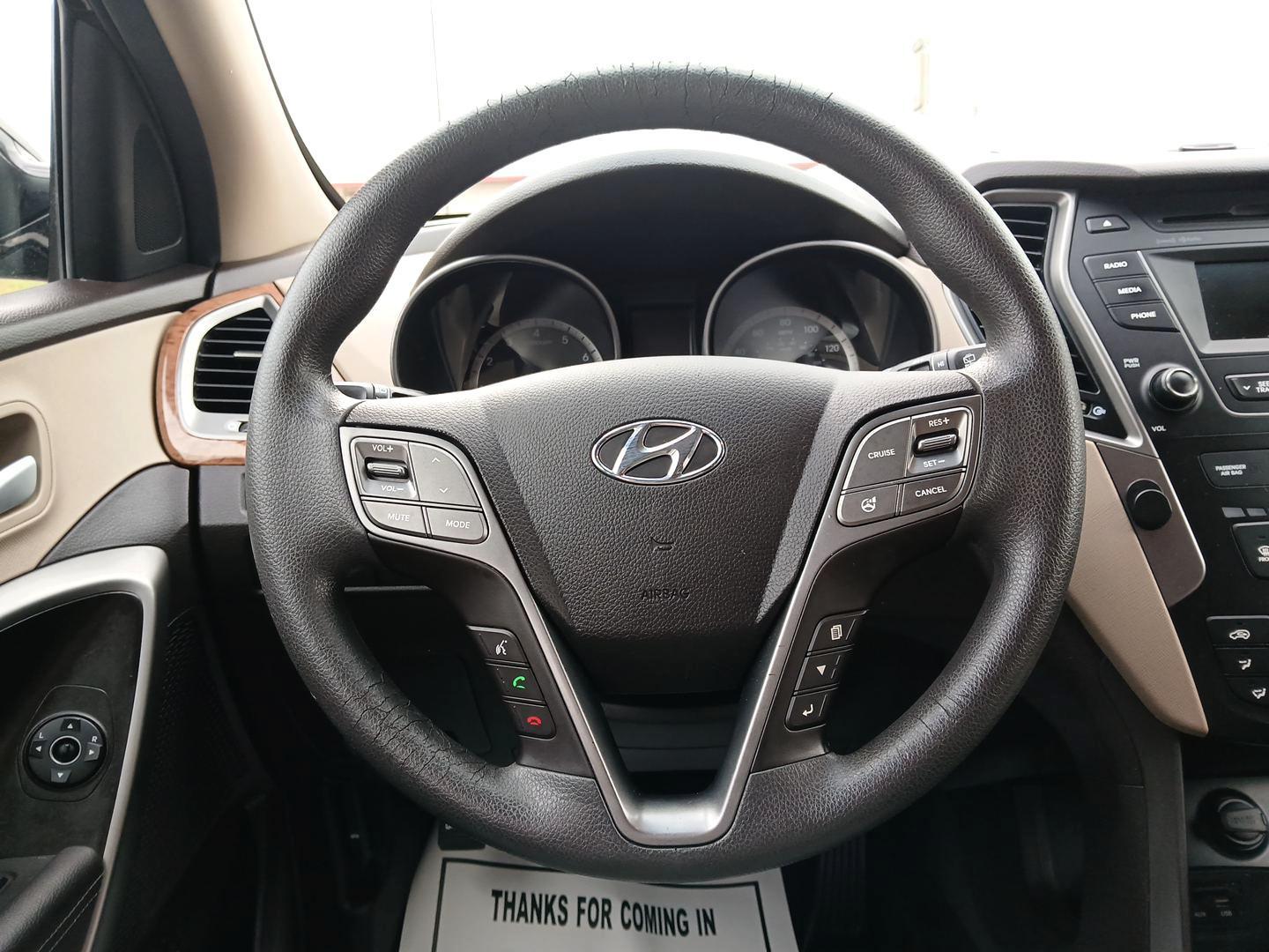 2016 Twilight Black Hyundai Santa Fe Sport 2.4 FWD (5XYZU3LB8GG) with an 2.4L L4 DOHC 16V engine, 6-Speed Automatic transmission, located at 880 E. National Road, Vandalia, OH, 45377, (937) 908-9800, 39.891918, -84.183594 - Photo#15