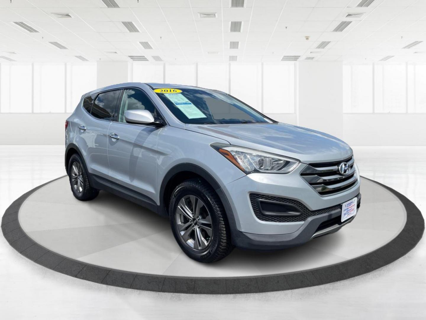 2016 Sparkling Silver Hyundai Santa Fe (5XYZTDLB8GG) with an 2.4L L4 DOHC 16V engine, 6-Speed Automatic transmission, located at 1184 Kauffman Ave, Fairborn, OH, 45324, (937) 908-9800, 39.807072, -84.030914 - Photo#0