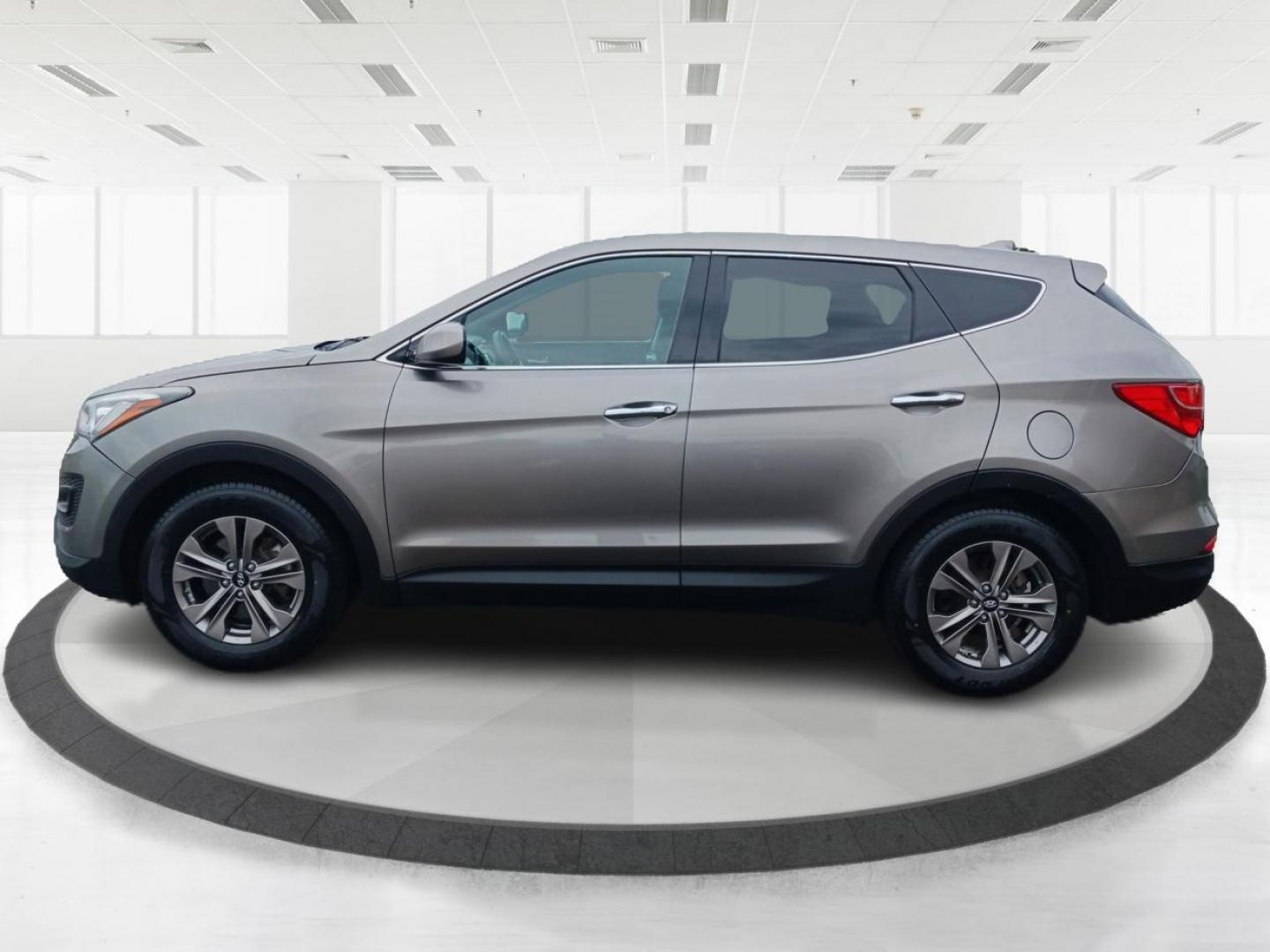 2016 Mineral Gray Hyundai Santa Fe Sport 2.4 FWD (5XYZT3LB2GG) with an 2.4L L4 DOHC 16V engine, 6-Speed Automatic transmission, located at 1184 Kauffman Ave, Fairborn, OH, 45324, (937) 908-9800, 39.807072, -84.030914 - Photo#5