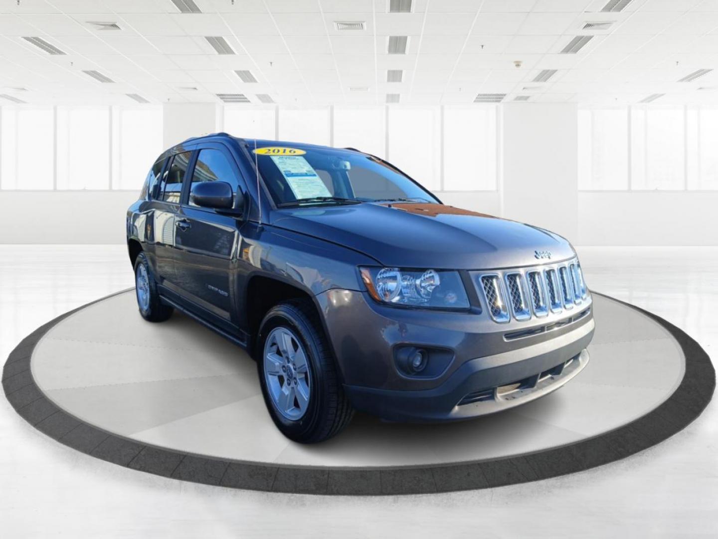 2016 Gray Jeep Compass Latitude FWD (1C4NJCEB4GD) with an 2.4L L4 DOHC 16V engine, CVT transmission, located at 880 E. National Road, Vandalia, OH, 45377, (937) 908-9800, 39.891918, -84.183594 - Photo#0