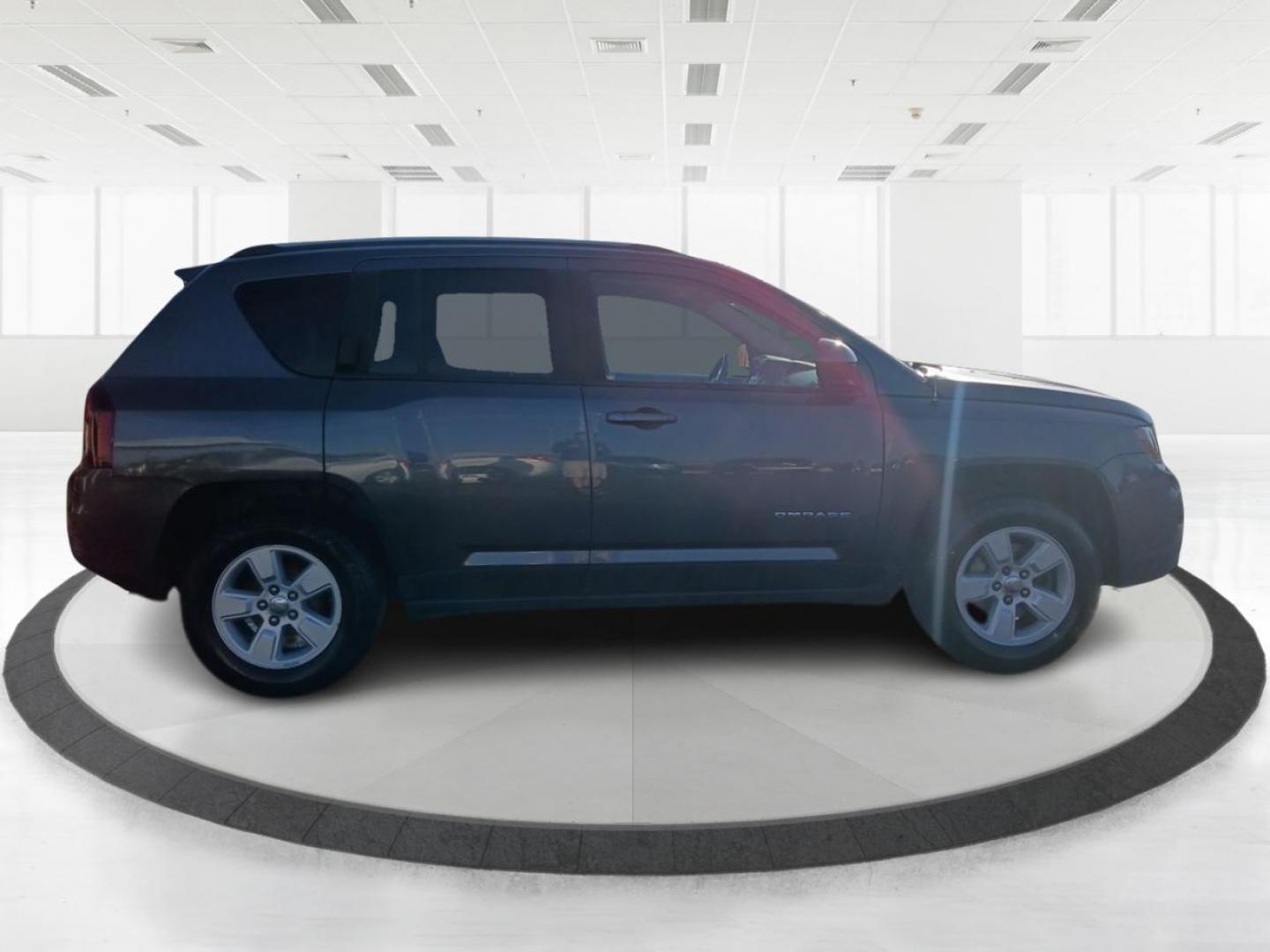 2016 Gray Jeep Compass Latitude FWD (1C4NJCEB4GD) with an 2.4L L4 DOHC 16V engine, CVT transmission, located at 880 E. National Road, Vandalia, OH, 45377, (937) 908-9800, 39.891918, -84.183594 - Photo#1