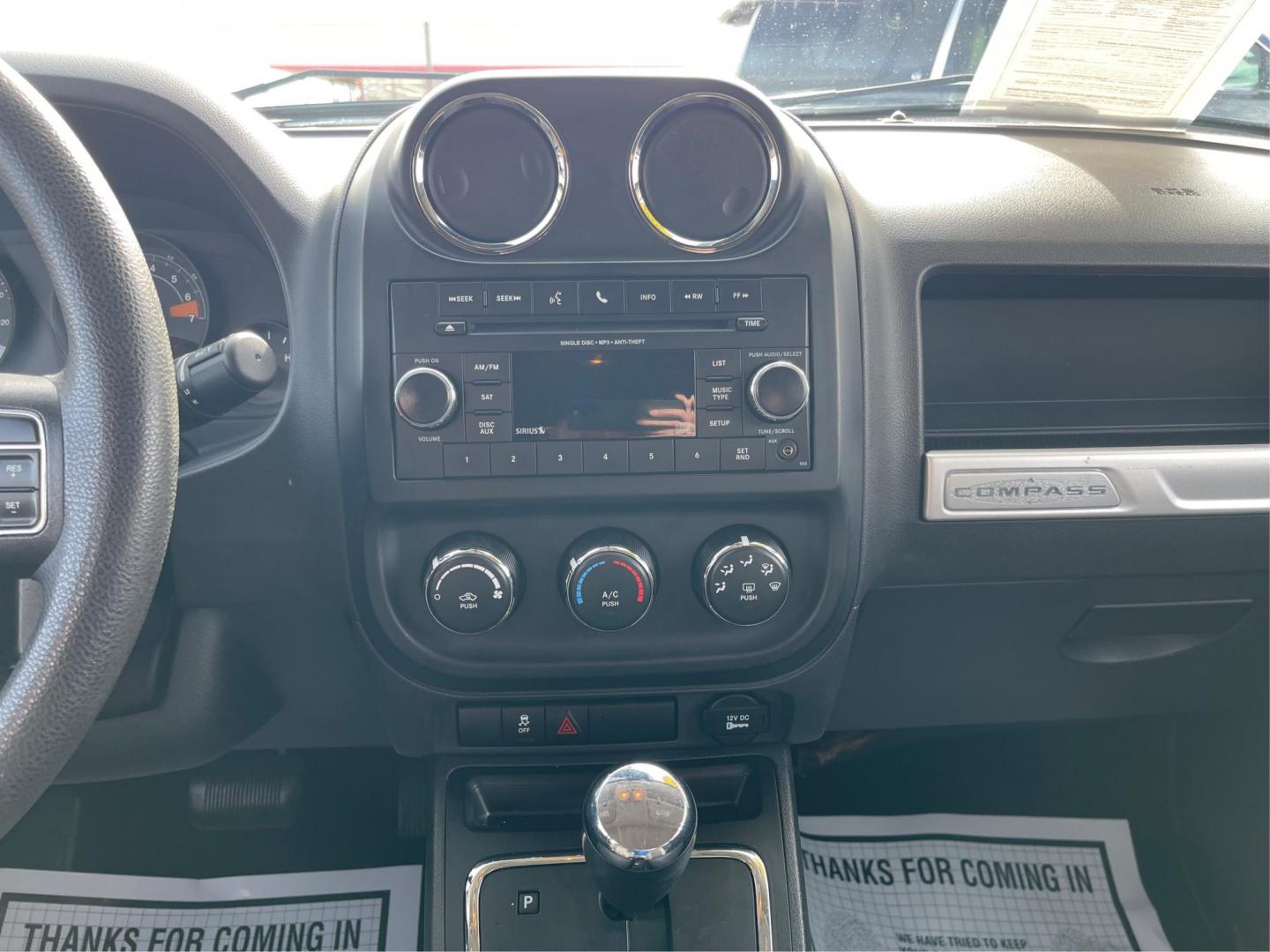 2016 Blue Jeep Compass Sport 4WD (1C4NJDBB5GD) with an 2.4L L4 DOHC 16V engine, located at 8750 N County Rd 25A, Piqua, OH, 45356, (937) 908-9800, 40.164391, -84.232513 - Photo#12