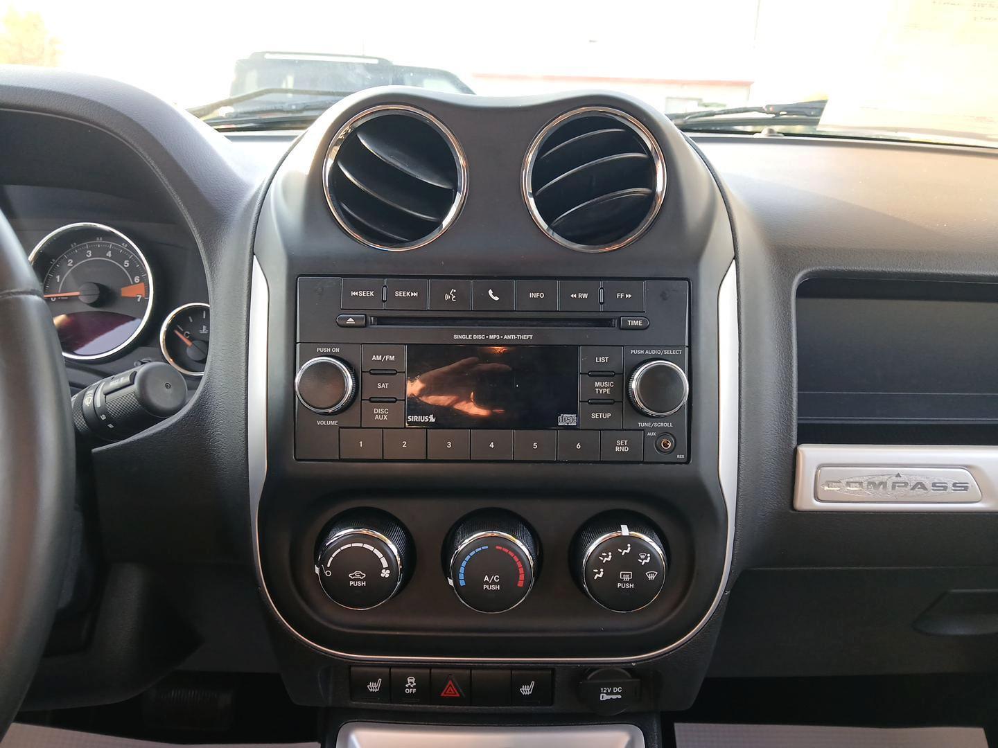 2016 Gray Jeep Compass Latitude FWD (1C4NJCEB4GD) with an 2.4L L4 DOHC 16V engine, CVT transmission, located at 880 E. National Road, Vandalia, OH, 45377, (937) 908-9800, 39.891918, -84.183594 - Photo#12