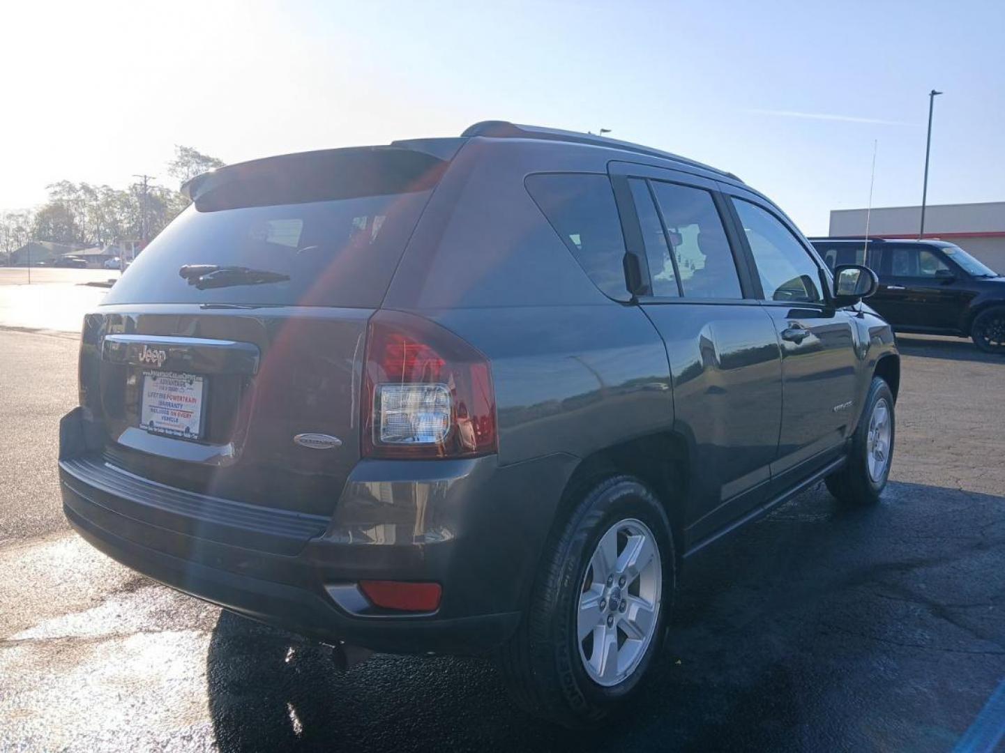 2016 Gray Jeep Compass Latitude FWD (1C4NJCEB4GD) with an 2.4L L4 DOHC 16V engine, CVT transmission, located at 880 E. National Road, Vandalia, OH, 45377, (937) 908-9800, 39.891918, -84.183594 - Photo#2