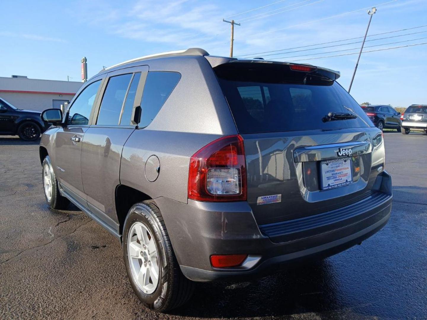 2016 Gray Jeep Compass Latitude FWD (1C4NJCEB4GD) with an 2.4L L4 DOHC 16V engine, CVT transmission, located at 880 E. National Road, Vandalia, OH, 45377, (937) 908-9800, 39.891918, -84.183594 - Photo#4