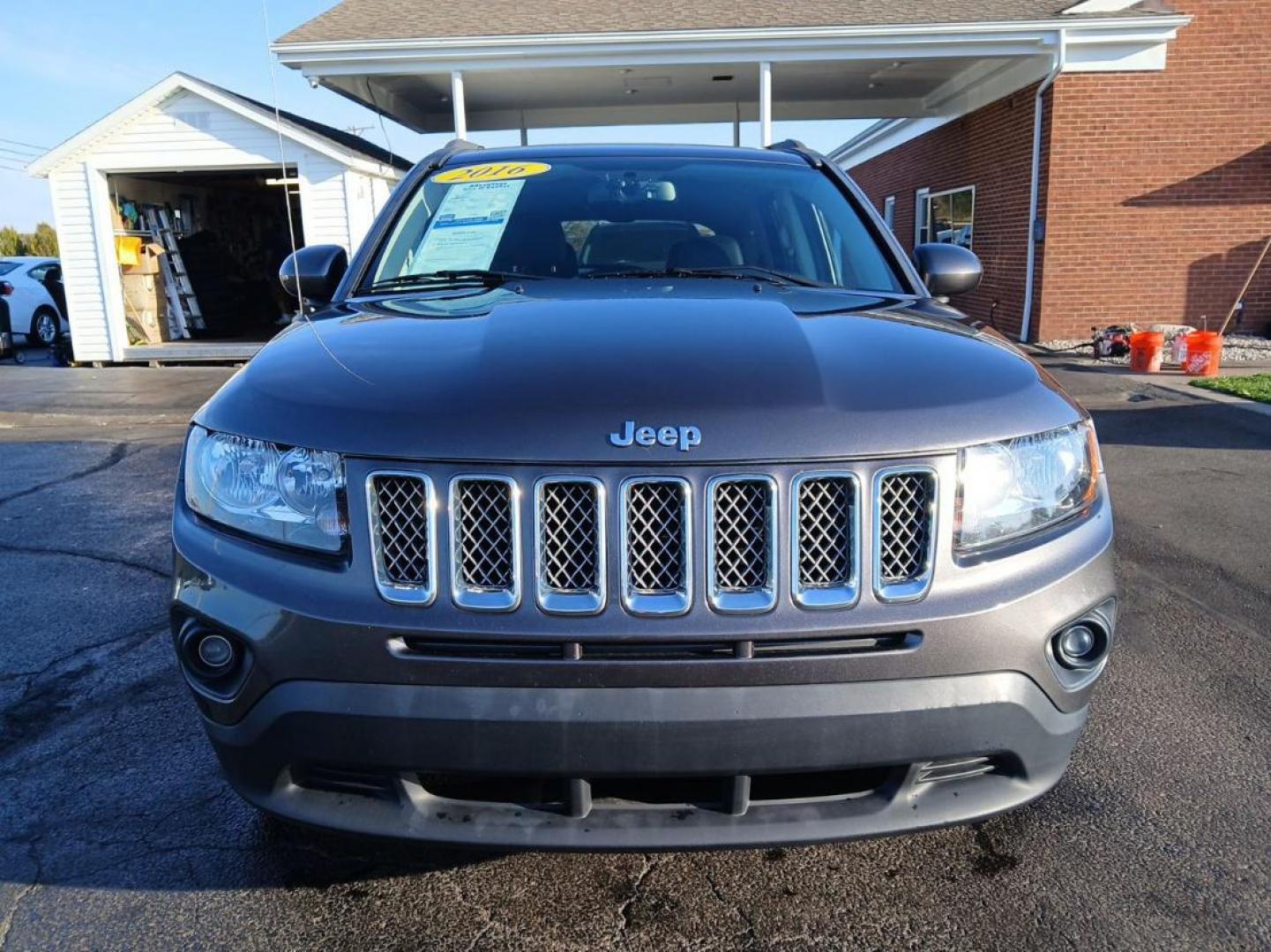 2016 Gray Jeep Compass Latitude FWD (1C4NJCEB4GD) with an 2.4L L4 DOHC 16V engine, CVT transmission, located at 880 E. National Road, Vandalia, OH, 45377, (937) 908-9800, 39.891918, -84.183594 - Photo#6