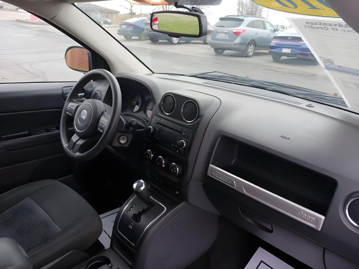 2016 Black Jeep Compass (1C4NJCBA6GD) with an 2.0L L4 DOHC 16V engine, located at 1184 Kauffman Ave, Fairborn, OH, 45324, (937) 908-9800, 39.807072, -84.030914 - Photo#8