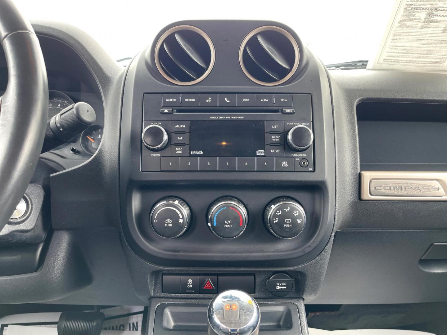 2016 White Jeep Compass (1C4NJCBBXGD) with an 2.4L L4 DOHC 16V engine, located at 4508 South Dixie Dr, Moraine, OH, 45439, (937) 908-9800, 39.689976, -84.218452 - Photo#11