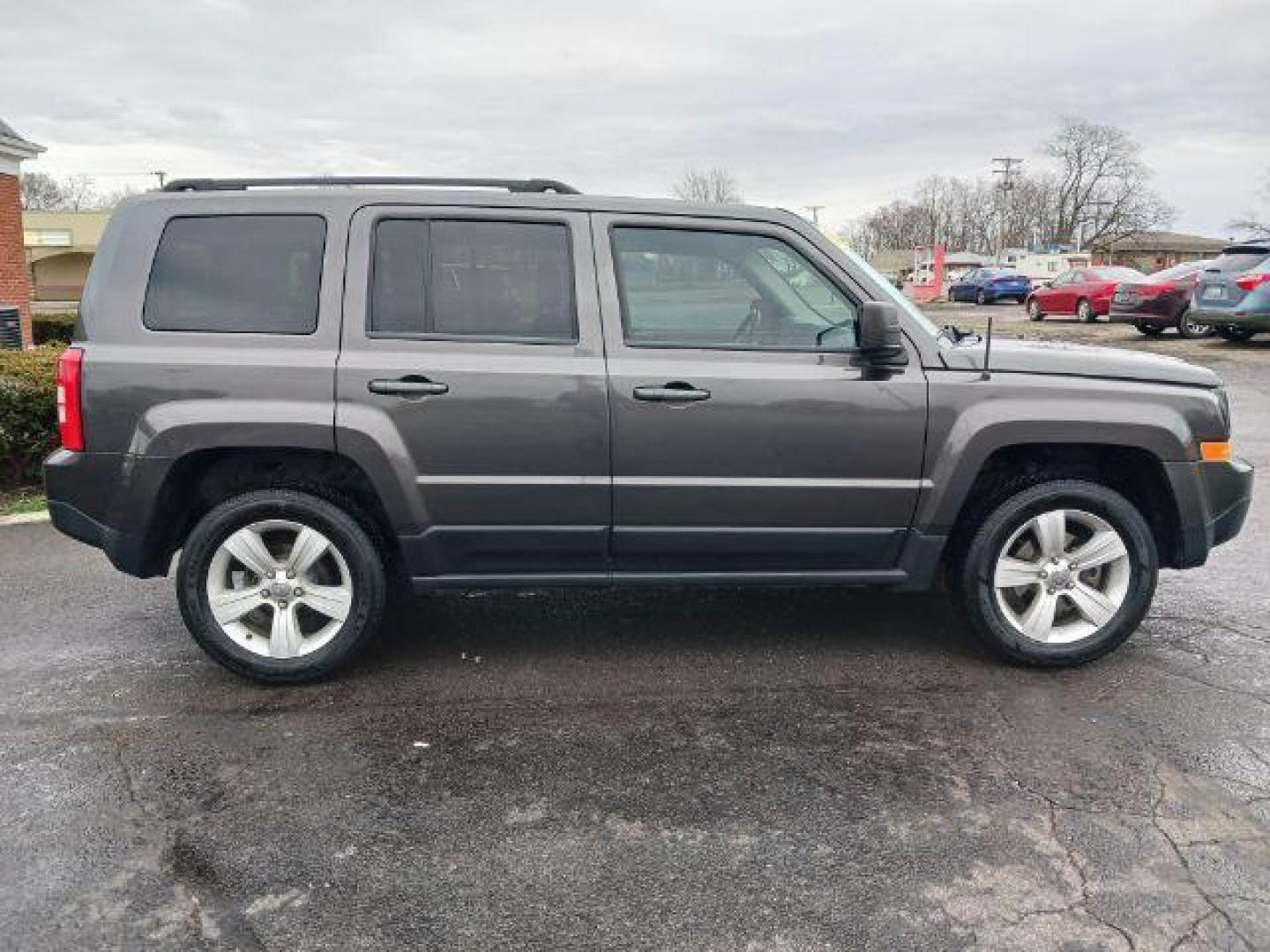 2016 Gray Jeep Patriot Latitude 4WD (1C4NJRFB8GD) with an 2.4L L4 DOHC 16V engine, located at 1184 Kauffman Ave, Fairborn, OH, 45324, (937) 908-9800, 39.807072, -84.030914 - Photo#4