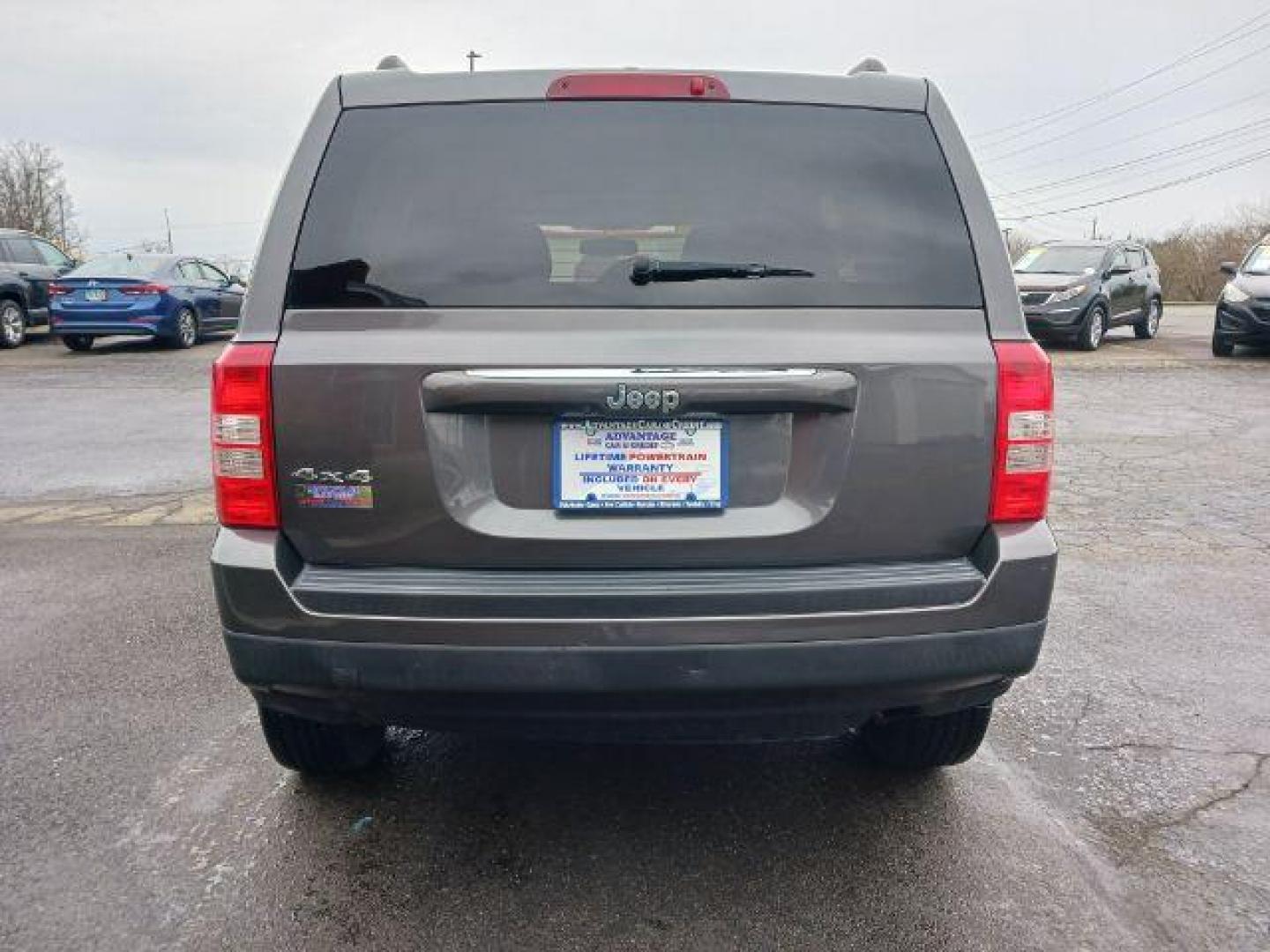 2016 Gray Jeep Patriot Latitude 4WD (1C4NJRFB8GD) with an 2.4L L4 DOHC 16V engine, located at 1184 Kauffman Ave, Fairborn, OH, 45324, (937) 908-9800, 39.807072, -84.030914 - Photo#5