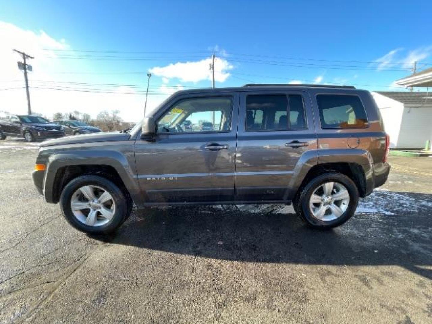 2016 Gray Jeep Patriot Latitude 4WD (1C4NJRFBXGD) with an 2.4L L4 DOHC 16V engine, located at 4508 South Dixie Dr, Moraine, OH, 45439, (937) 908-9800, 39.689976, -84.218452 - Photo#2