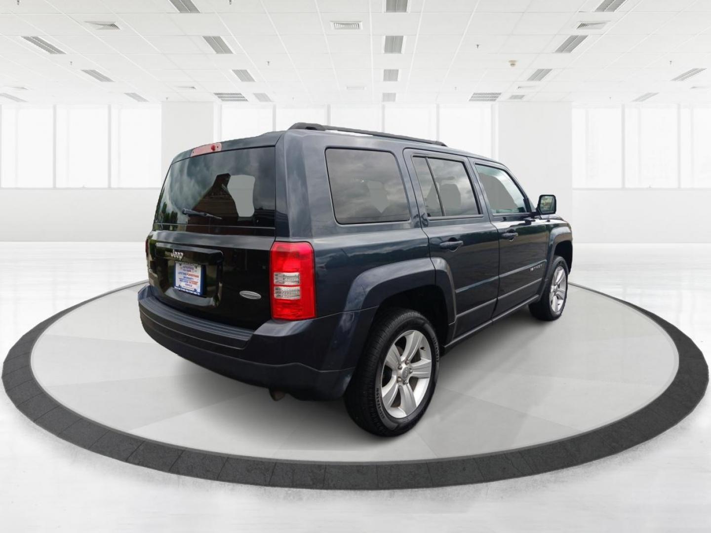 2016 Gray Jeep Patriot (1C4NJRFB0GD) with an 2.4L L4 DOHC 16V engine, located at 880 E. National Road, Vandalia, OH, 45377, (937) 908-9800, 39.891918, -84.183594 - Photo#2