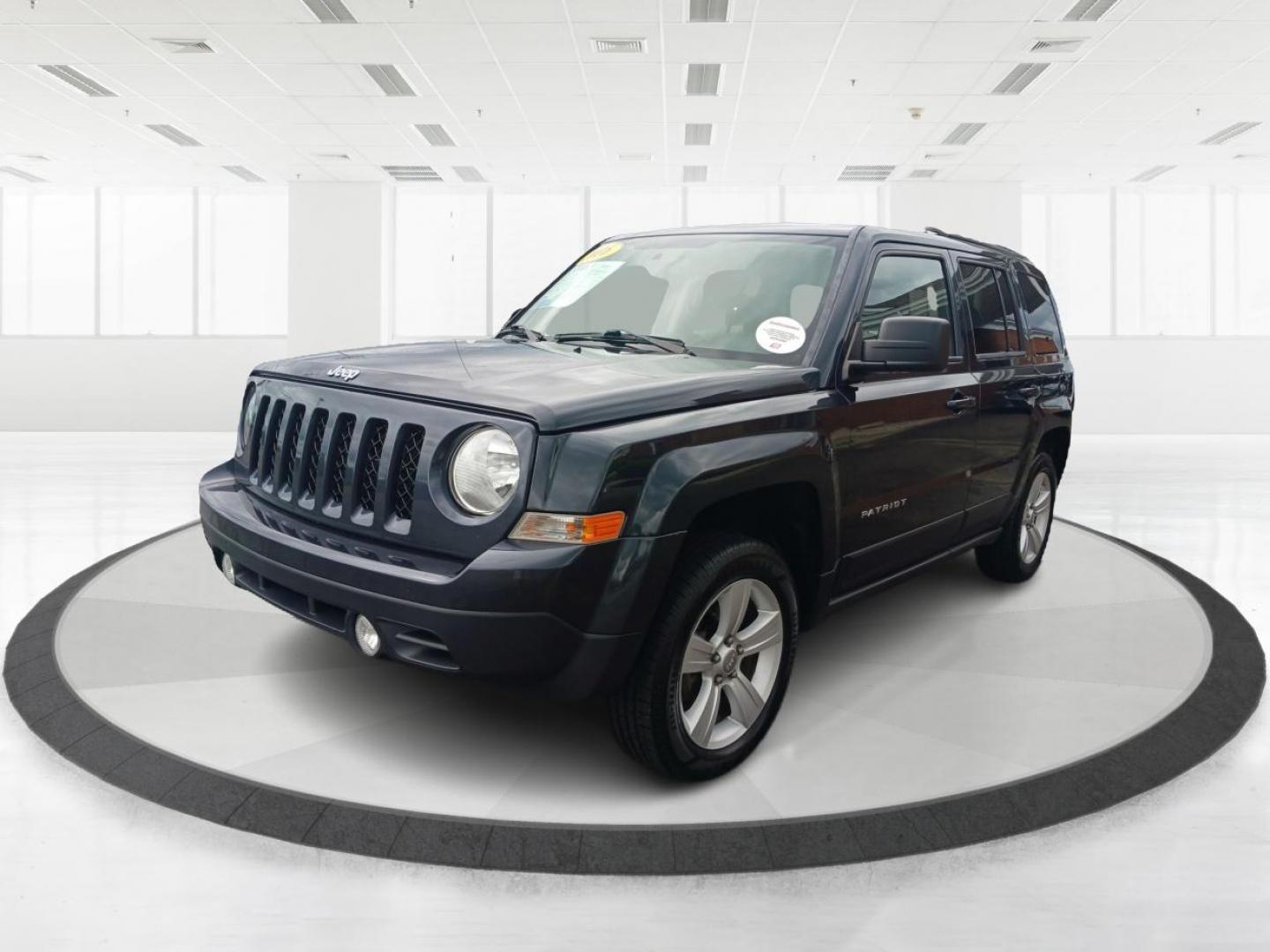 2016 Gray Jeep Patriot (1C4NJRFB0GD) with an 2.4L L4 DOHC 16V engine, located at 880 E. National Road, Vandalia, OH, 45377, (937) 908-9800, 39.891918, -84.183594 - Photo#7