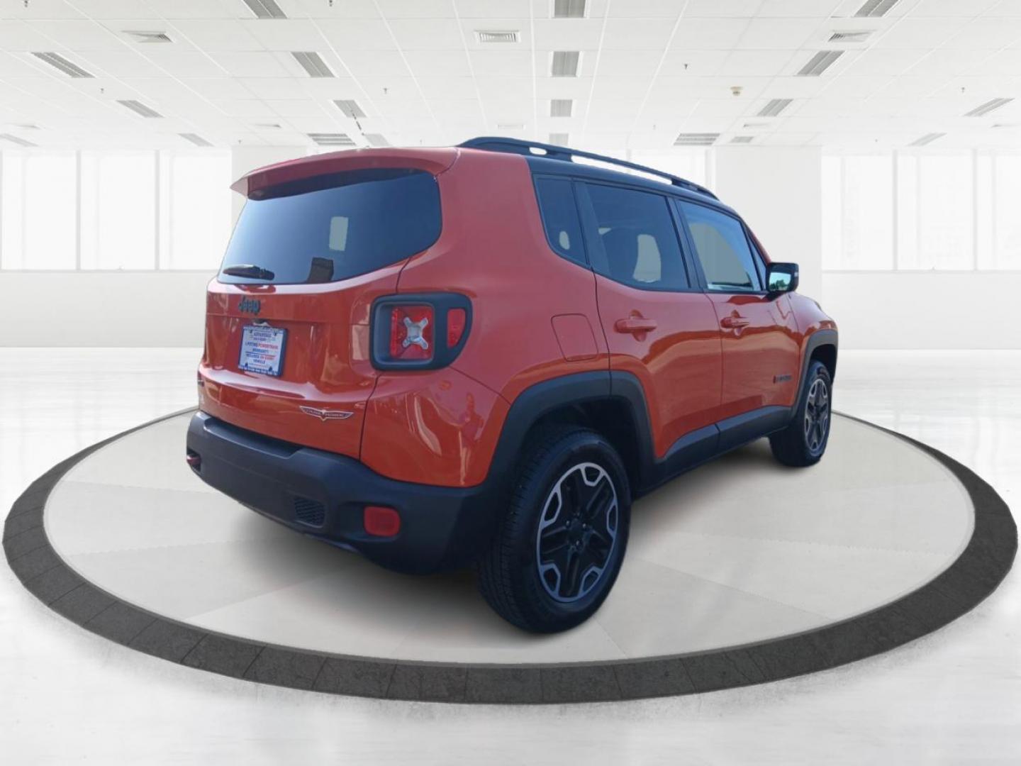 2016 Omaha Orange Jeep Renegade Trailhawk (ZACCJBCTXGP) with an 2.4L L4 DOHC 16V engine, 9A transmission, located at 1951 S Dayton Lakeview Rd., New Carlisle, OH, 45344, (937) 908-9800, 39.890999, -84.050255 - Photo#1