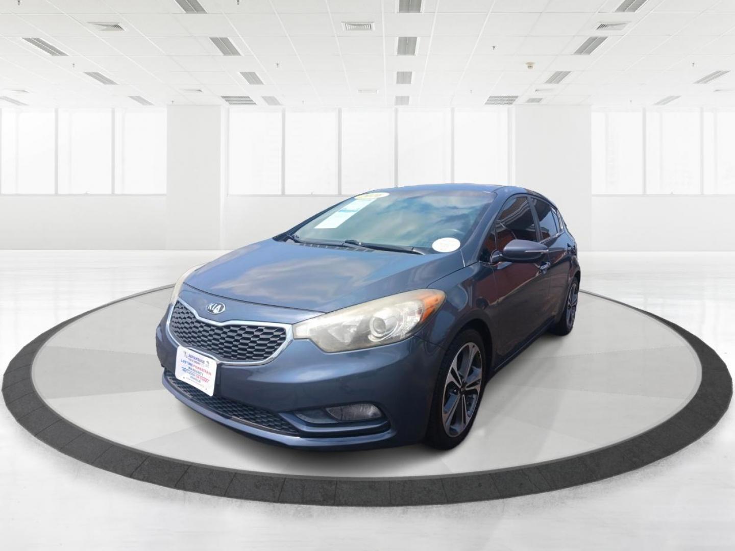 2016 Steel Blue Kia Forte 5-Door (KNAFX5A89G5) with an 2.0L L4 DOHC 16V engine, 6-Speed Automatic transmission, located at 1230 East Main St, Xenia, OH, 45385, (937) 908-9800, 39.688026, -83.910172 - Photo#7