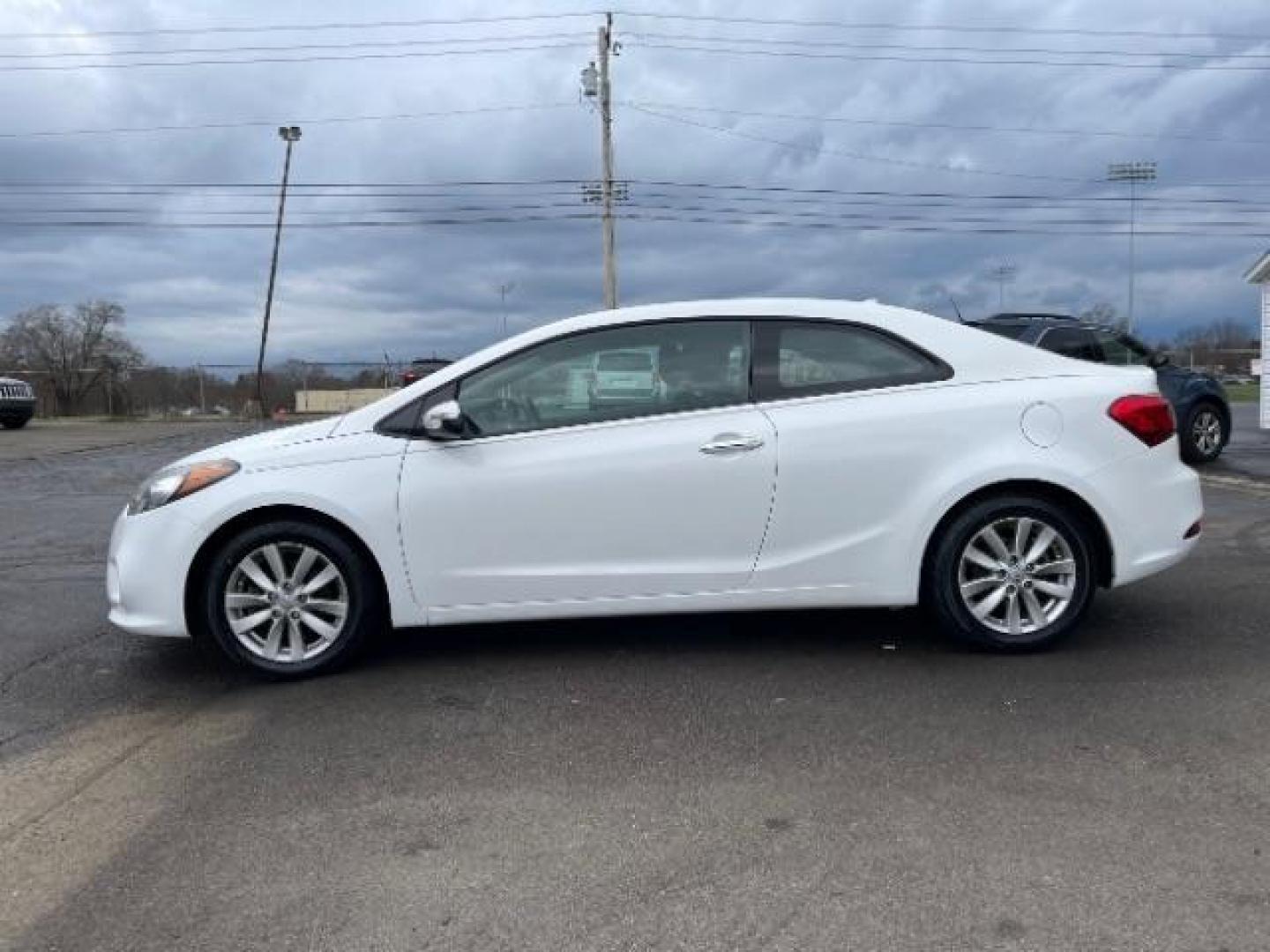 2016 Snow White Pearl Kia Forte Koup EX (KNAFX6A87G5) with an 2.0L L4 DOHC 16V engine, 6-Speed Automatic transmission, located at 4508 South Dixie Dr, Moraine, OH, 45439, (937) 908-9800, 39.689976, -84.218452 - Photo#2