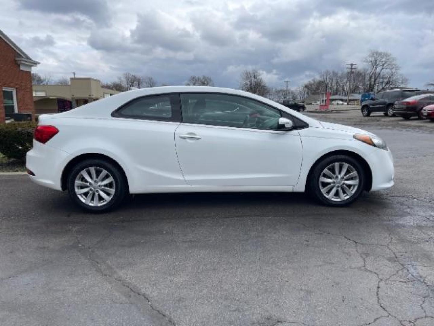 2016 Snow White Pearl Kia Forte Koup EX (KNAFX6A87G5) with an 2.0L L4 DOHC 16V engine, 6-Speed Automatic transmission, located at 4508 South Dixie Dr, Moraine, OH, 45439, (937) 908-9800, 39.689976, -84.218452 - Photo#3