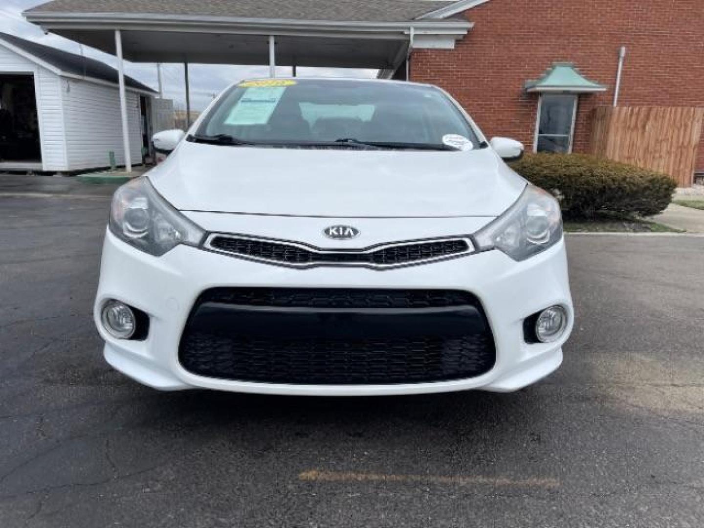 2016 Snow White Pearl Kia Forte Koup EX (KNAFX6A87G5) with an 2.0L L4 DOHC 16V engine, 6-Speed Automatic transmission, located at 4508 South Dixie Dr, Moraine, OH, 45439, (937) 908-9800, 39.689976, -84.218452 - Photo#4