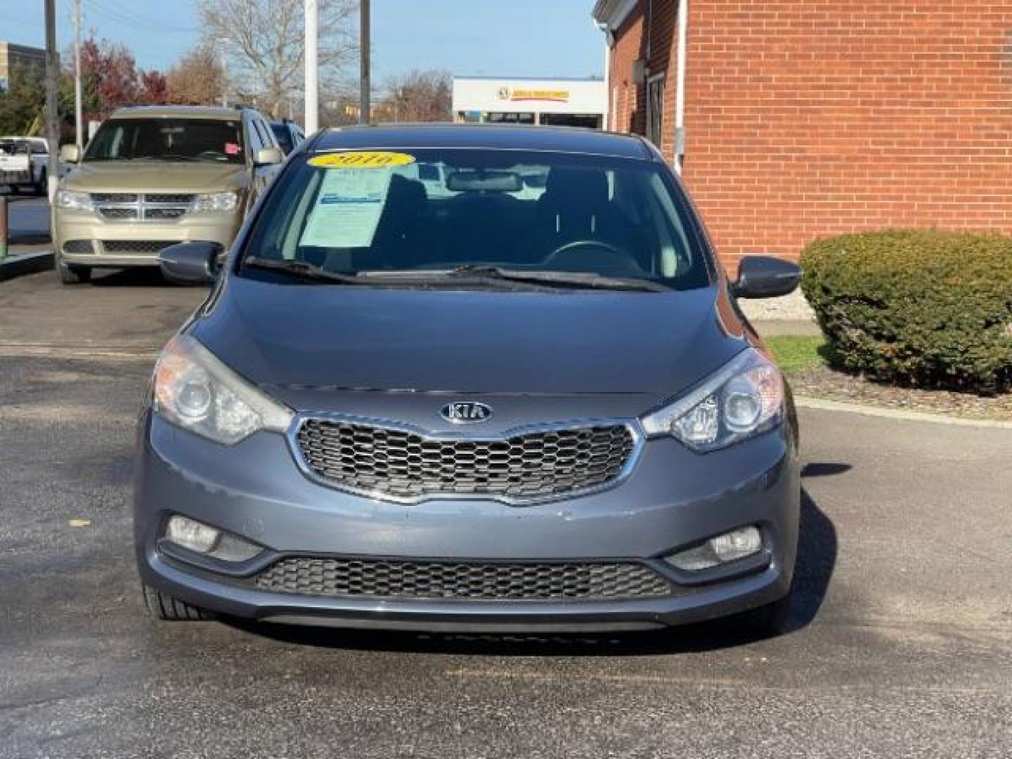 2016 Graphite Steel Kia Forte EX (KNAFX4A85G5) with an 2.0L L4 DOHC 16V engine, 6-Speed Automatic transmission, located at 1230 East Main St, Xenia, OH, 45385, (937) 908-9800, 39.688026, -83.910172 - Photo#4