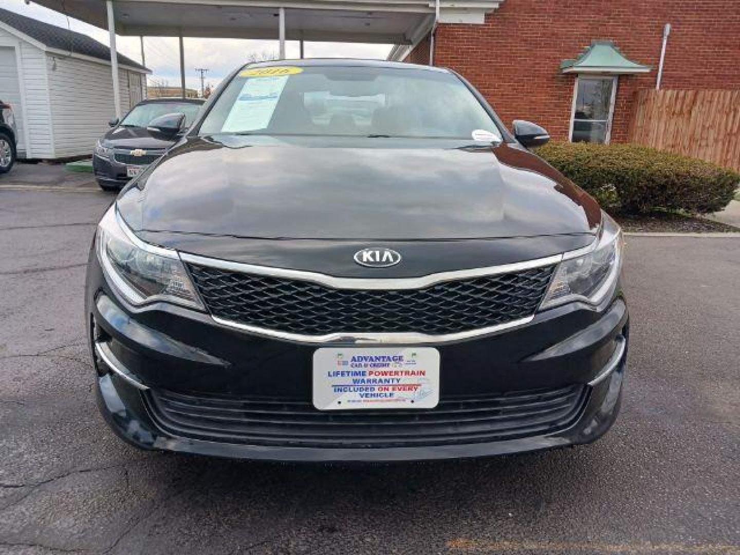 2016 Ebony Black Kia Optima LX (5XXGT4L39GG) with an 2.4L L4 DOHC 16V engine, 6-Speed Automatic transmission, located at 1230 East Main St, Xenia, OH, 45385, (937) 908-9800, 39.688026, -83.910172 - Photo#1