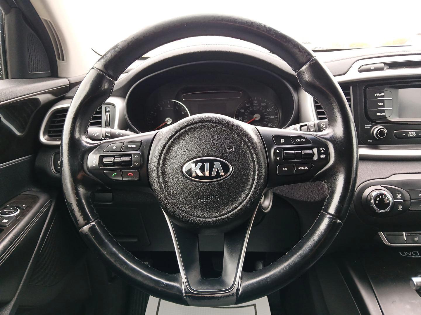 2016 Ebony Black Kia Sorento LX 2WD (5XYPG4A30GG) with an 2.4L L4 DOHC 16V engine, 6-Speed Automatic transmission, located at 1099 N County Rd 25A , Troy, OH, 45373, (937) 908-9800, 40.057079, -84.212883 - Photo#15